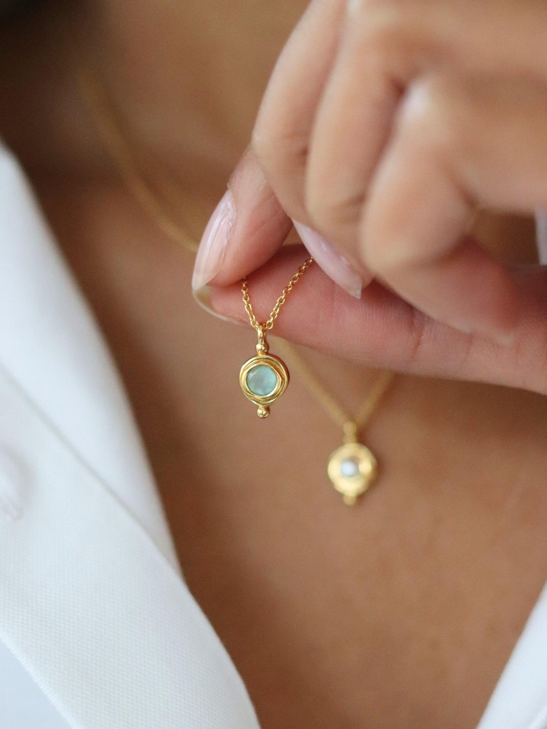 Product image 2 of 3, which shows Ottoman Hands March Birthstone Necklace, Gold