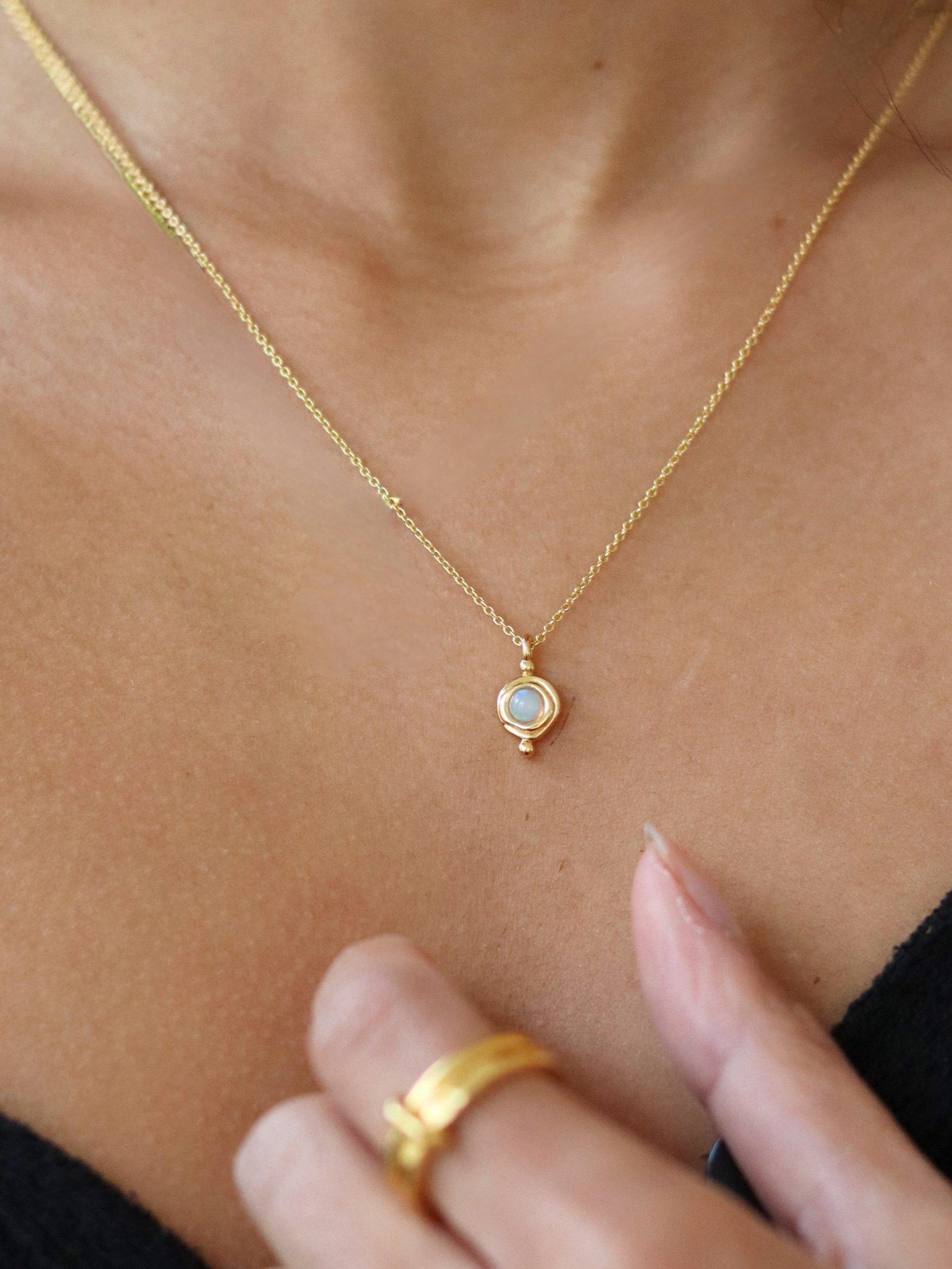 Product image 2 of 3, which shows Ottoman Hands October Birthstone Necklace, Gold