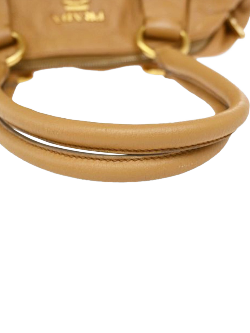 Product image 7 of 10, which shows Pre-loved Prada Vitello Daino Leather Top Handle Bag, Beige