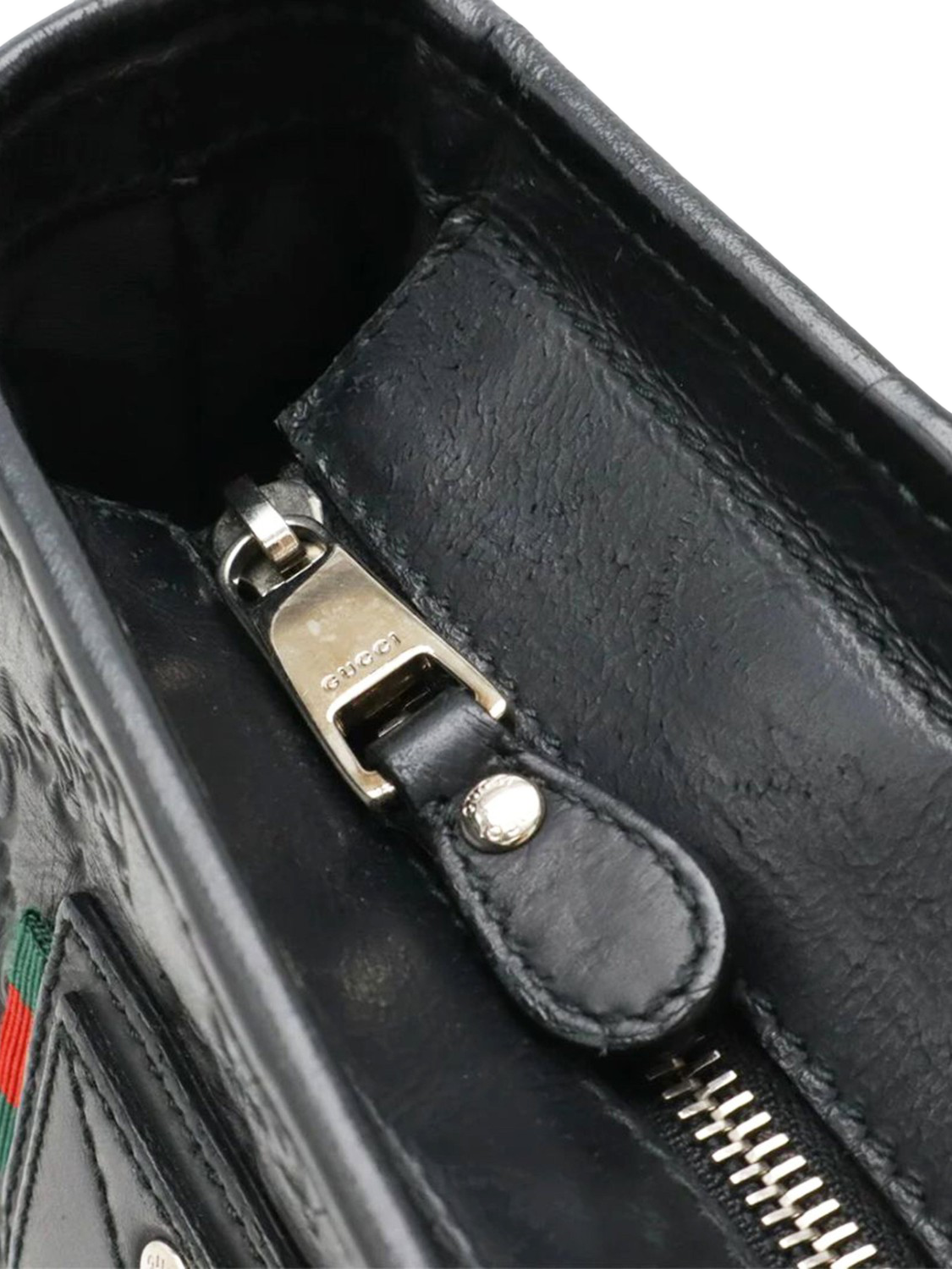 Product image 4 of 8, which shows Pre-loved GUCCI Guccissima Leather Messenger Bag, Black