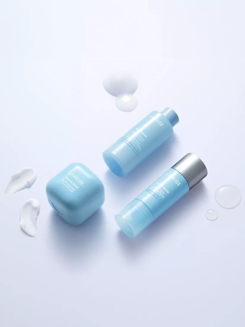 Laneige Water Bank skincare set with blue jar and two bottles on white background with gel and cream swatches