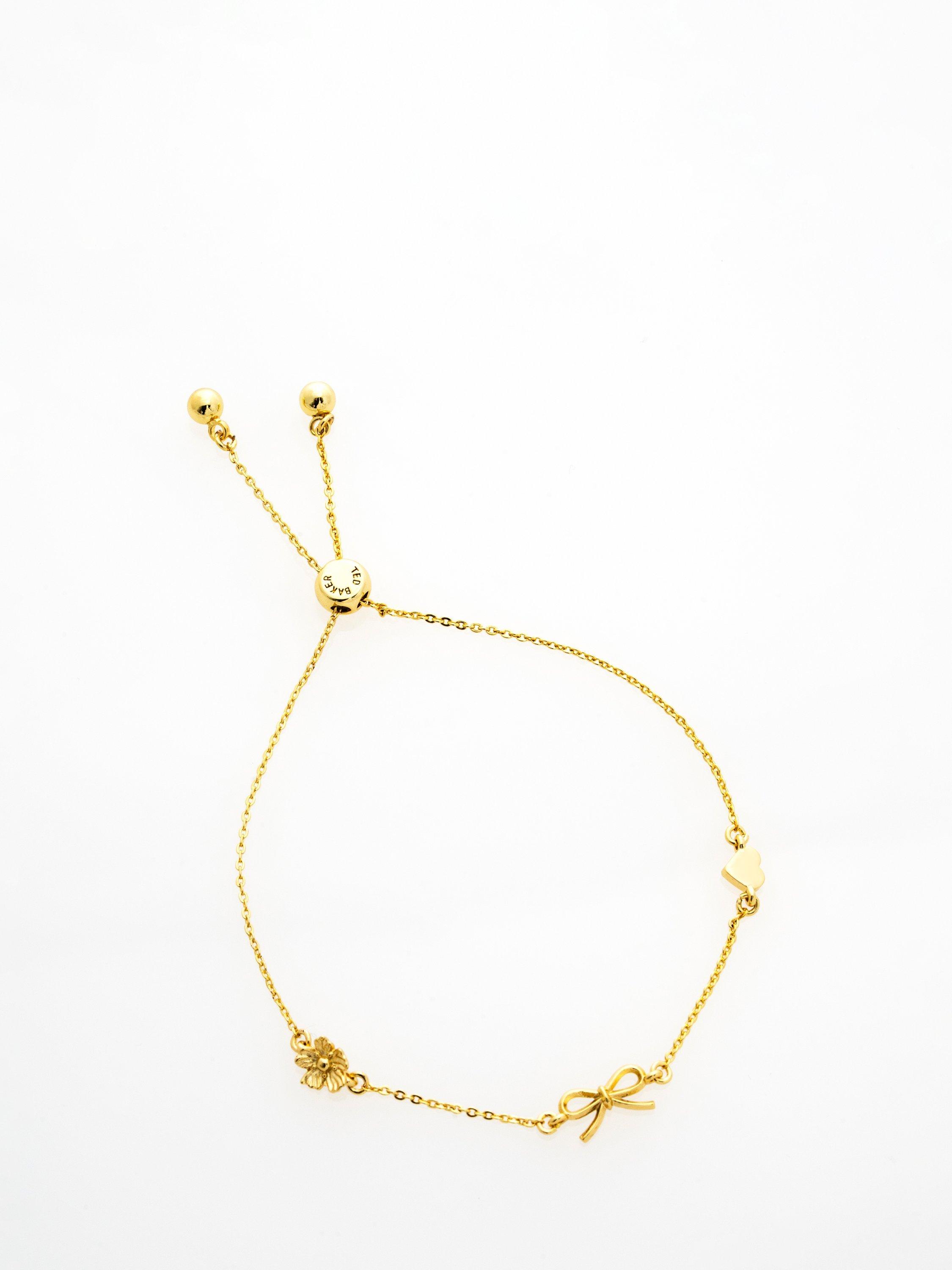 Product image 5 of 6, which shows Ted Baker Ilona Mini Icons Adjustable Bracelet, Gold