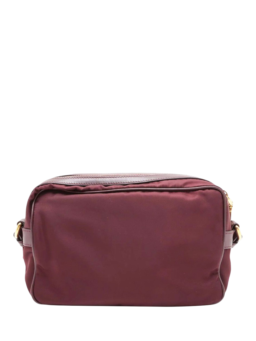 Product image 2 of 10, which shows Pre-loved Prada Nylon Gold Hardware Crossbody Bag, Burgundy