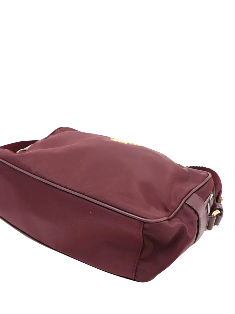 Product image 3 of 10, which shows Pre-loved Prada Nylon Gold Hardware Crossbody Bag, Burgundy
