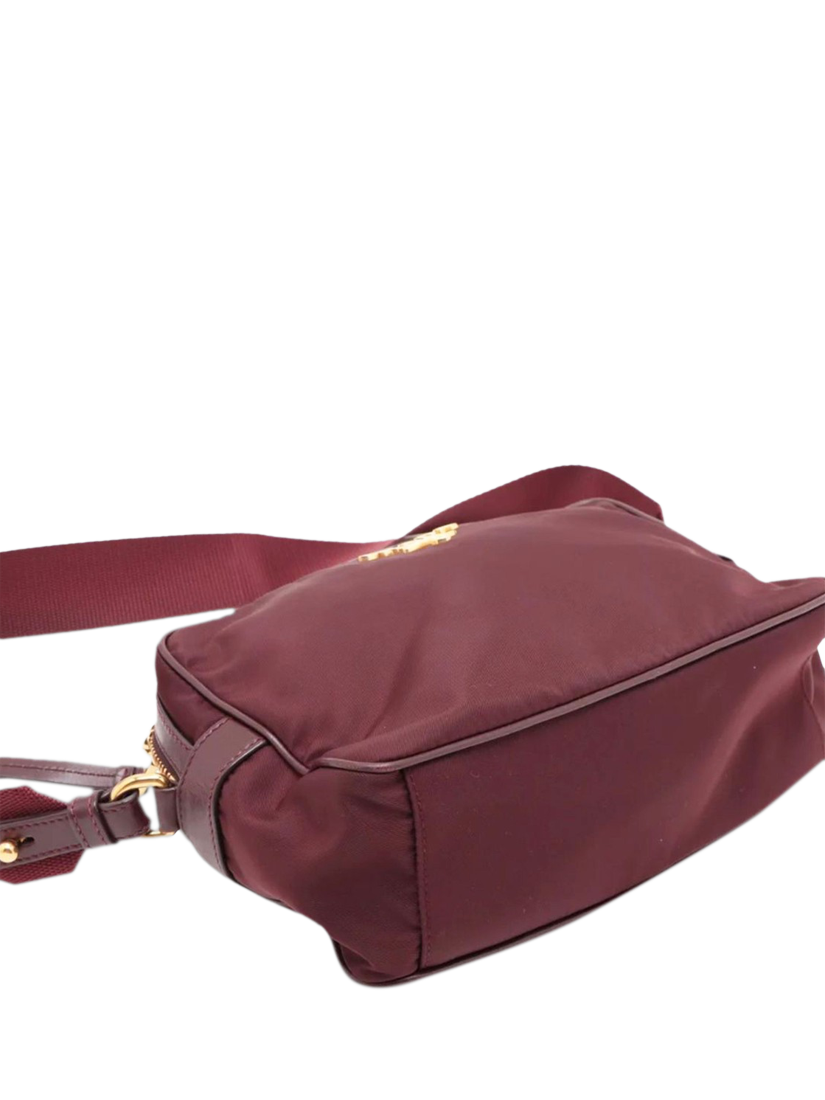 Product image 4 of 10, which shows Pre-loved Prada Nylon Gold Hardware Crossbody Bag, Burgundy
