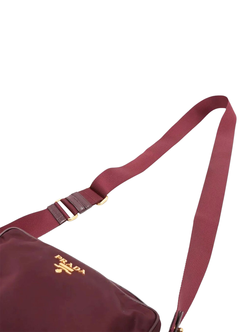 Product image 5 of 10, which shows Pre-loved Prada Nylon Gold Hardware Crossbody Bag, Burgundy