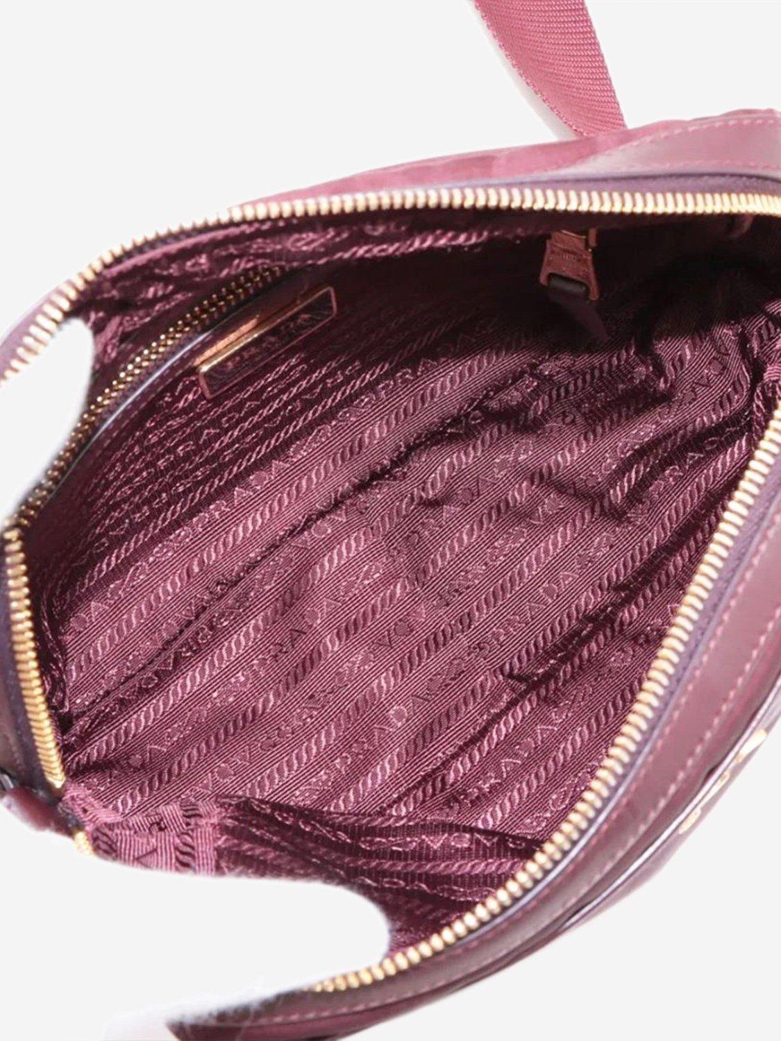 Product image 6 of 10, which shows Pre-loved Prada Nylon Gold Hardware Crossbody Bag, Burgundy