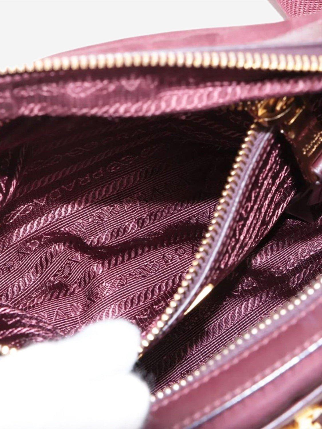 Product image 7 of 10, which shows Pre-loved Prada Nylon Gold Hardware Crossbody Bag, Burgundy