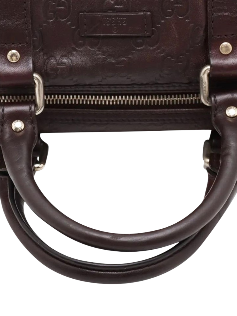 Product image 5 of 10, which shows Pre-loved GUCCI Guccissima Leather Top Handle Bag, Dark Brown