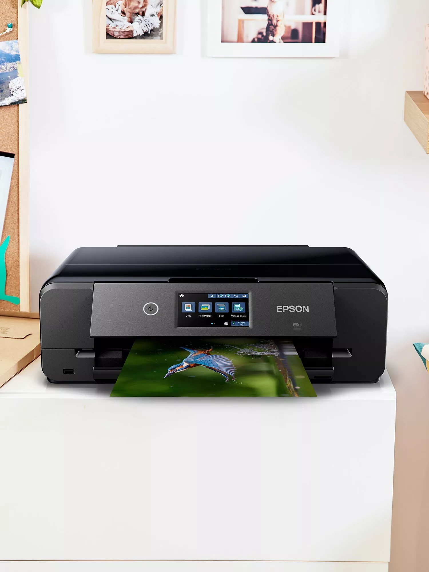 Epson wireless photo printer printing a high-quality bird photograph in a bright home office setting