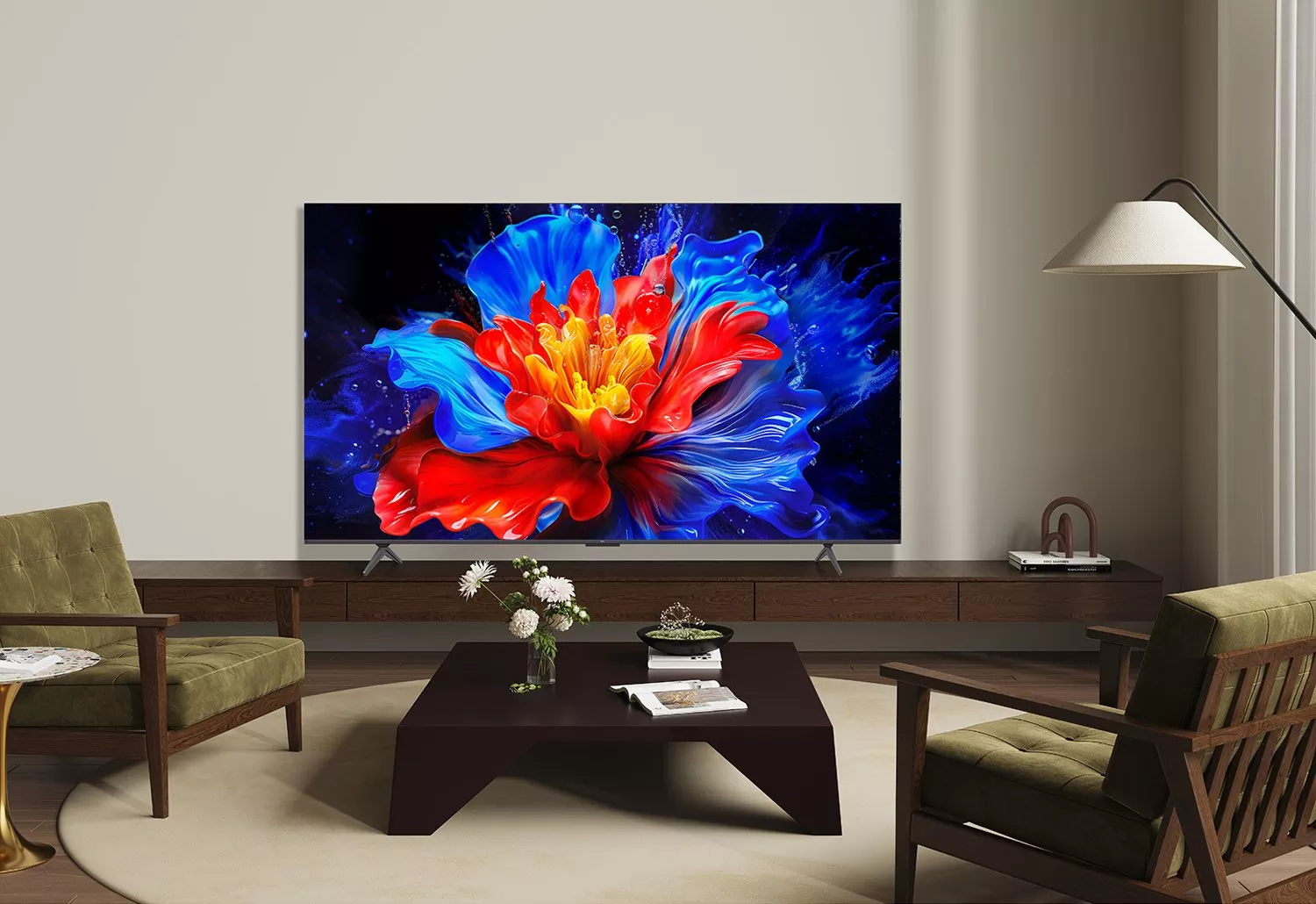 Modern living room with large 4K TV displaying vibrant abstract flower art on a low wooden media unit