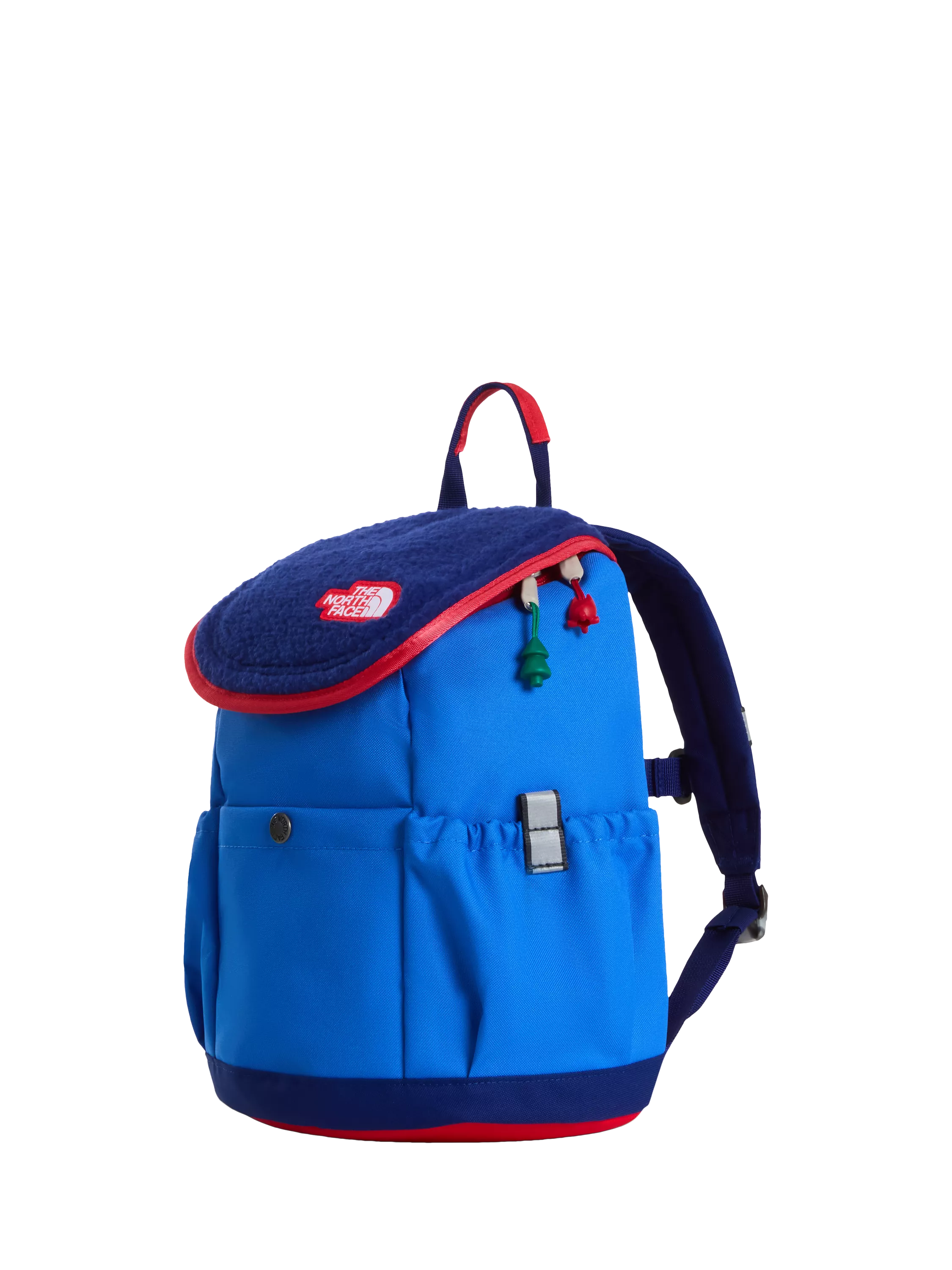 Blue The North Face kids backpack with fleece flap, red trim and drawcord toggles on black background
