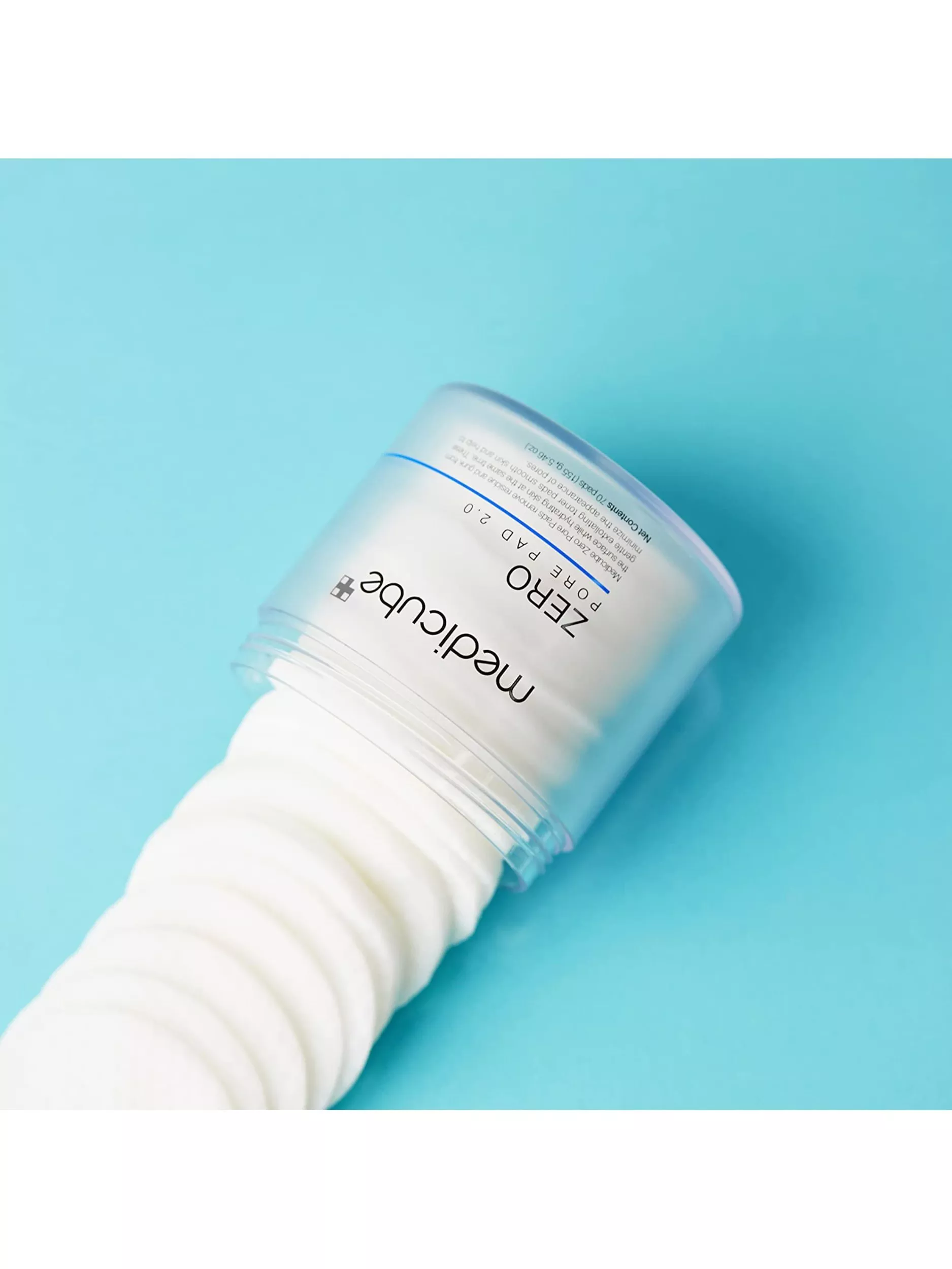 Medicube Zero Pore Pad 2.0 skincare toner pads in icy water splash, lactic acid and panthenol label visible