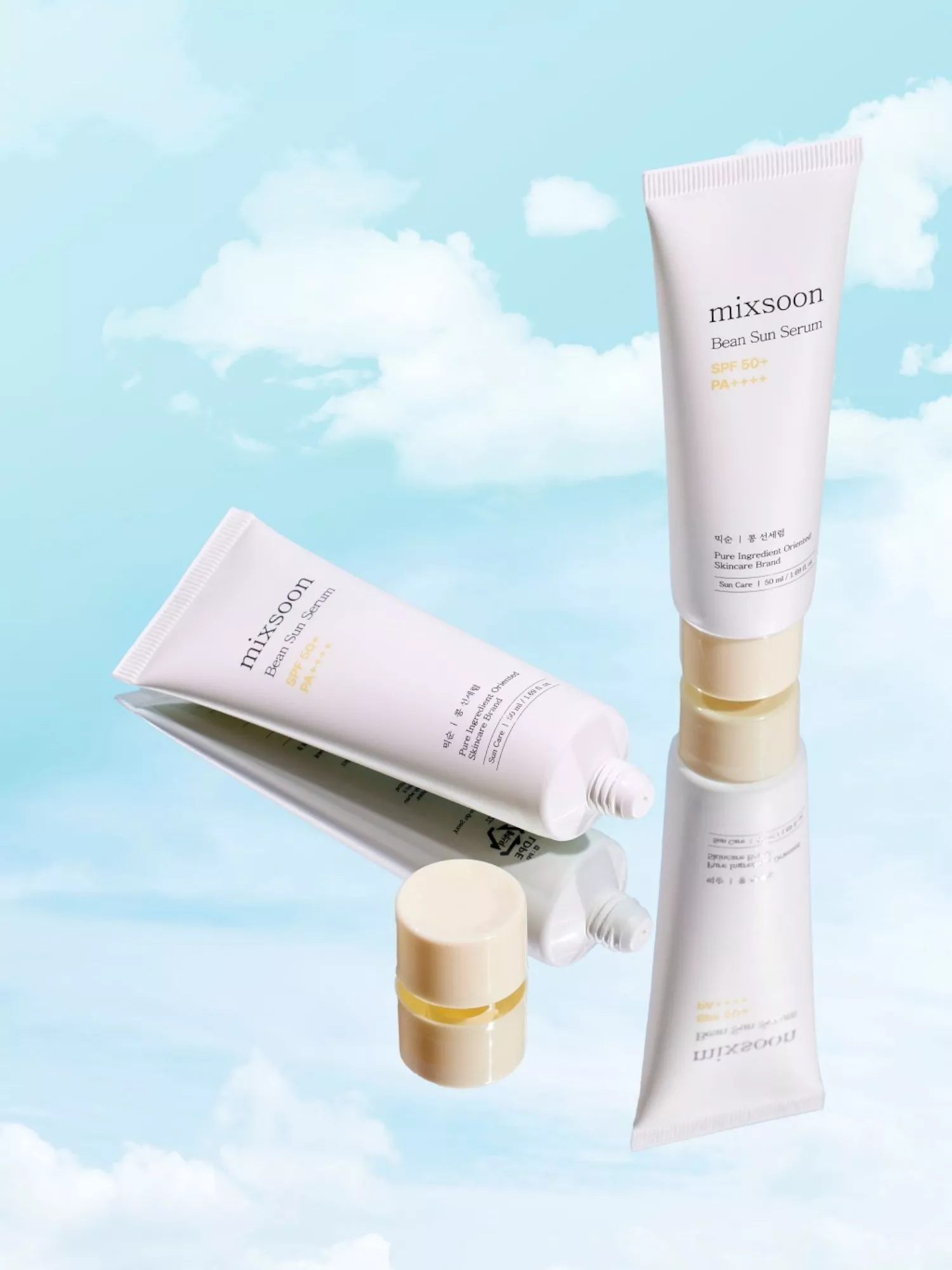 Clinique Moisture Surge Eye 96-Hour Hydro-Filler Concentrate bottle with water splash and colourful spheres.