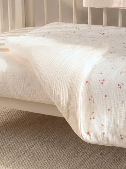 CuddleCo Reversible Cotbed Quilt, 3.5 Tog, Ditsy Cherry - view 2, Ditsy Cherry