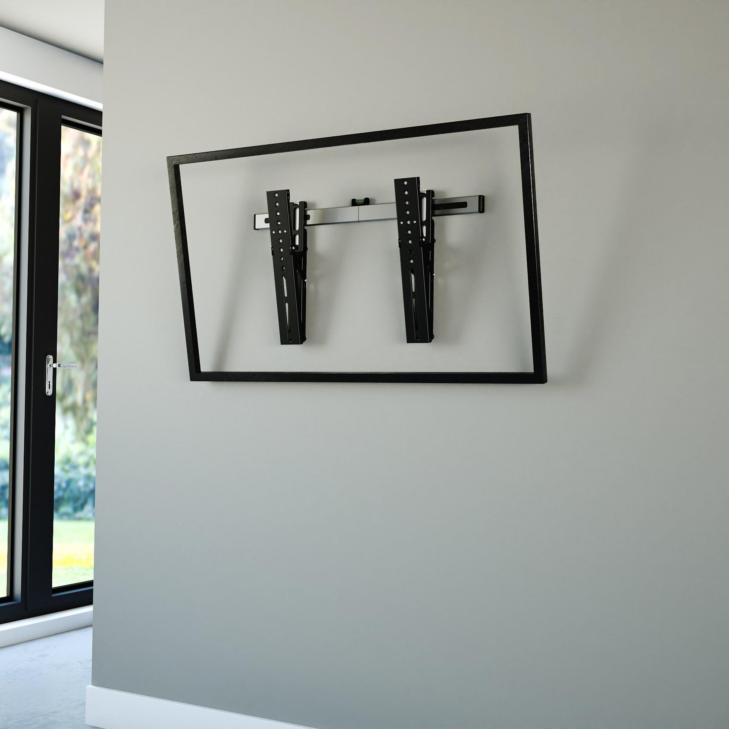 Tilting wall mount