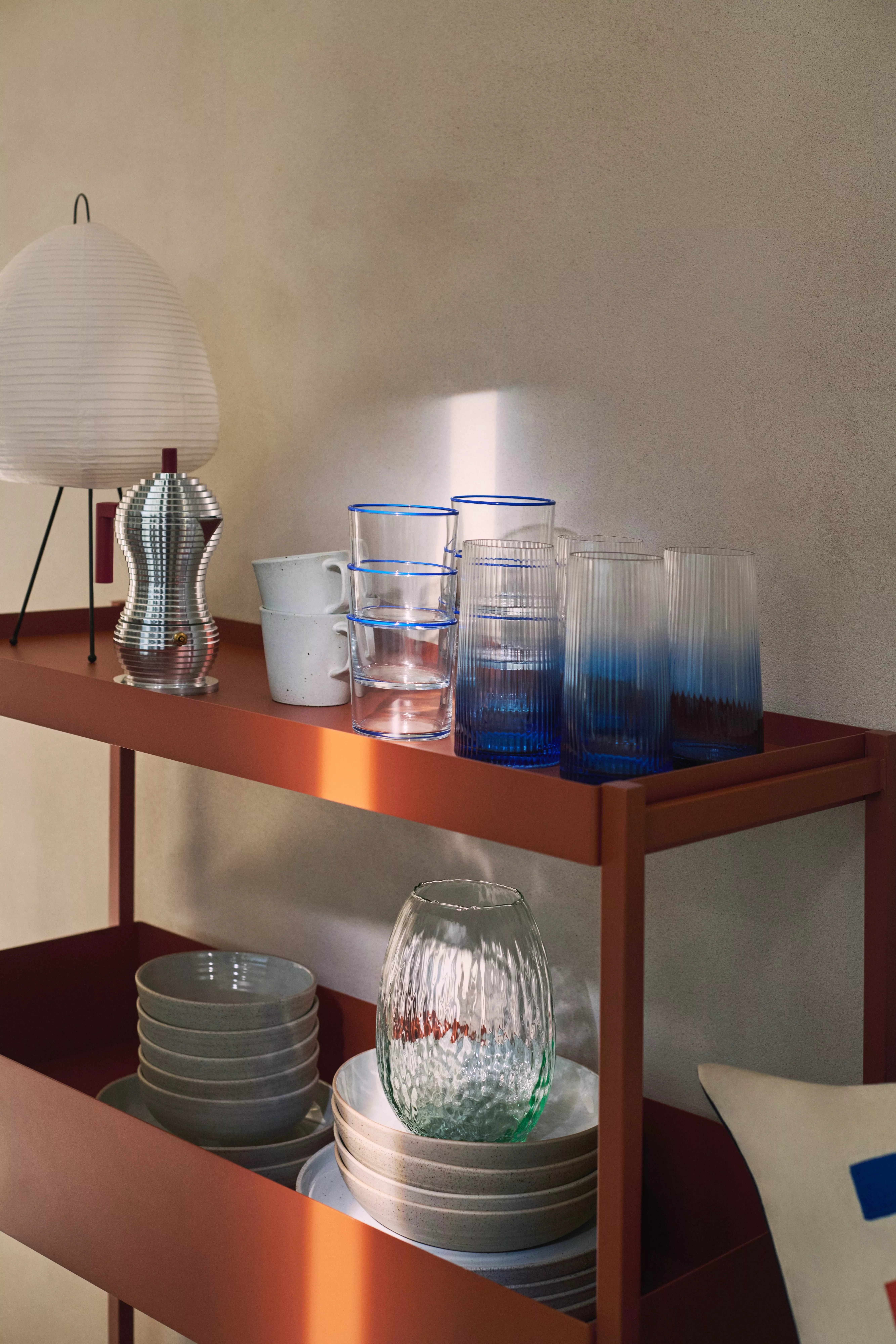 trolley with glasses and bowls on