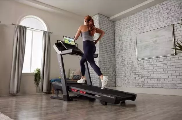 woman running on a treadmill