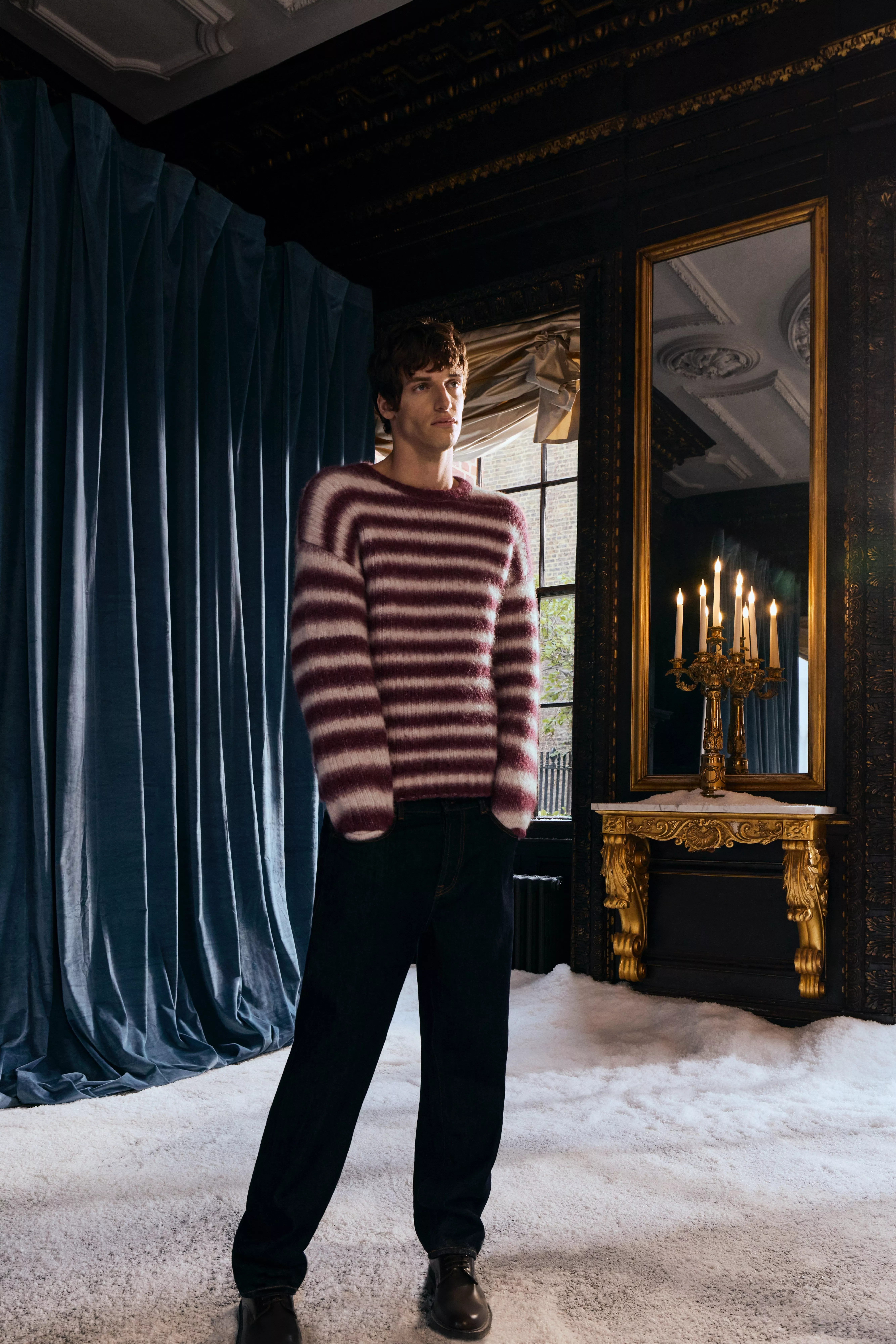 Man wearing a pink and red stripe jumper