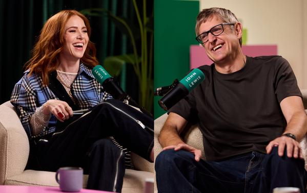 Angela Scanlon and Louis Theroux laughing during a podcast interview, seated with microphones in a studio lounge setting.