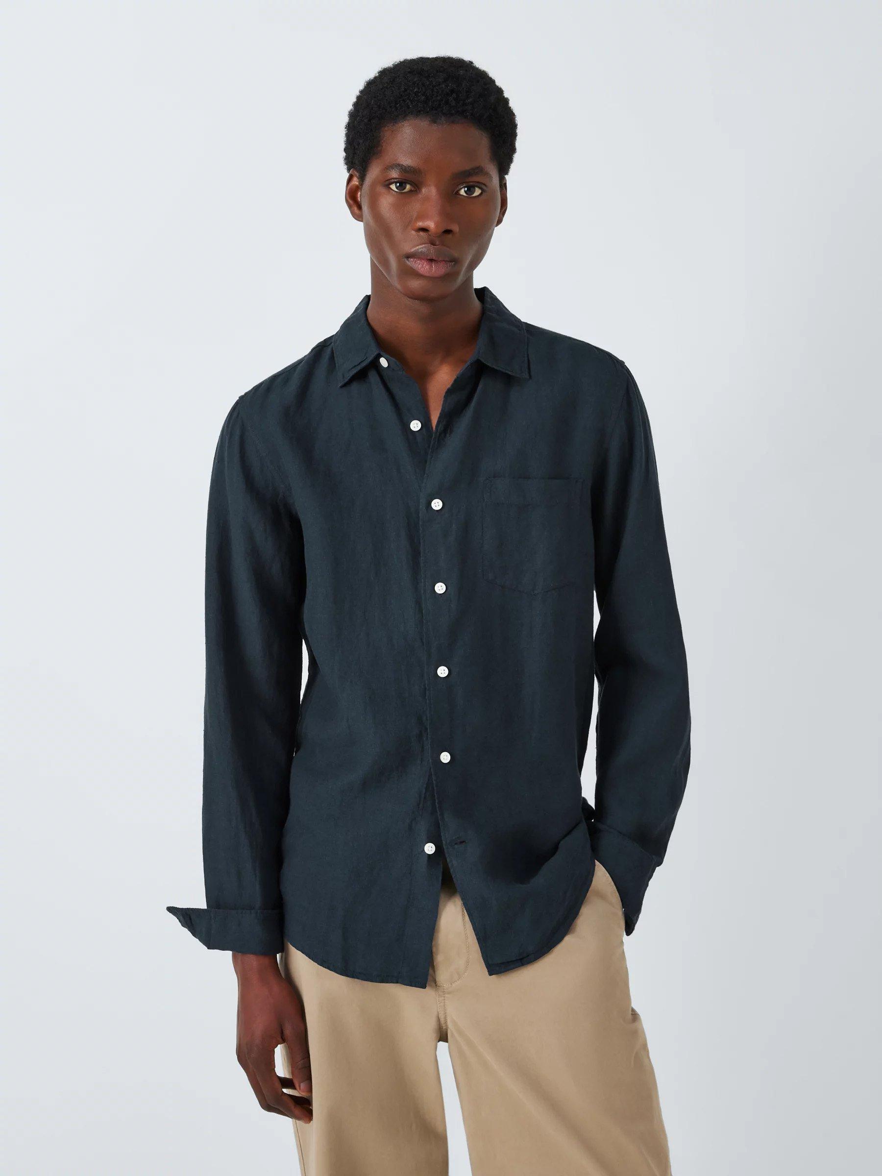 Man in dark linen shirt, long sleeved