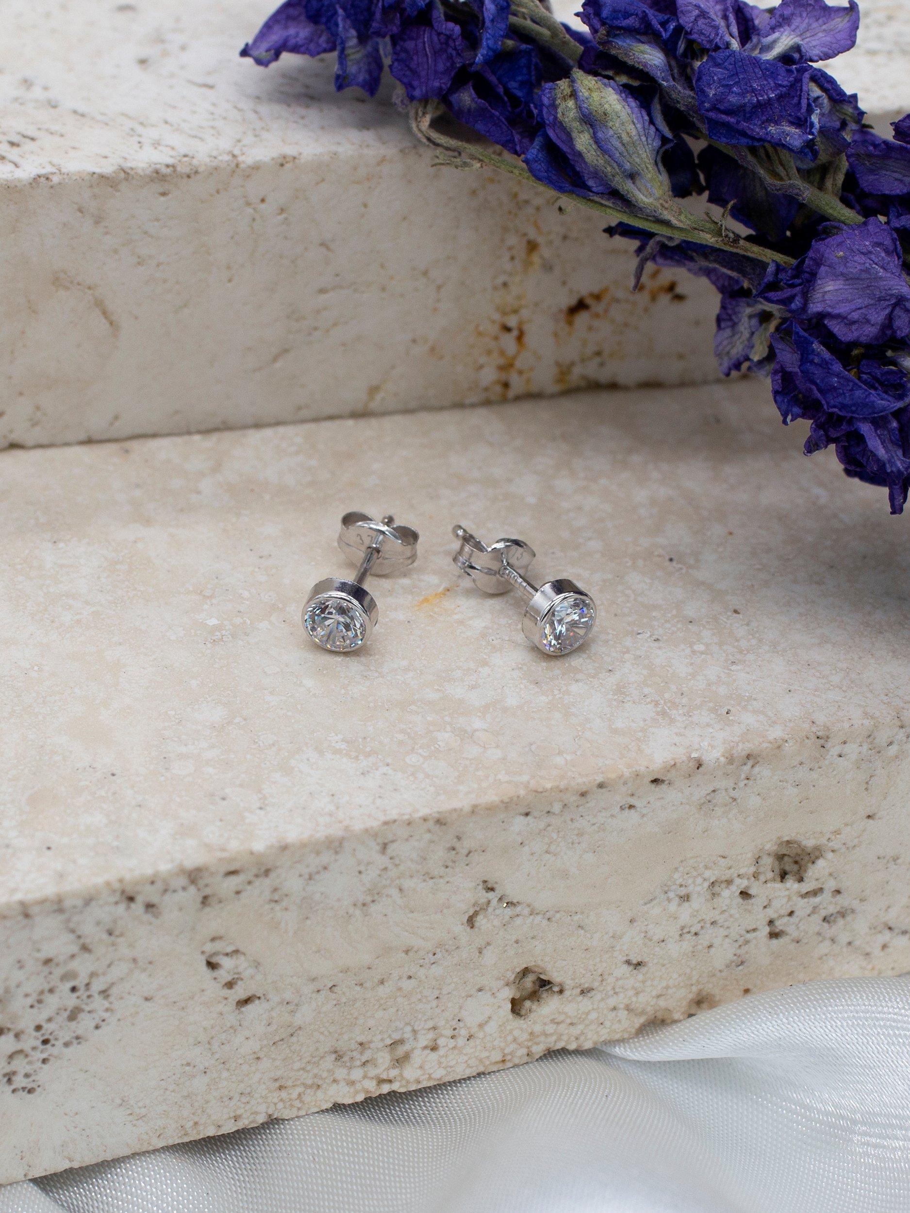 Product image 3 of 4, which shows IBB 9ct White Gold Small Rubover Cubic Zirconia Stud Earrings, White Gold