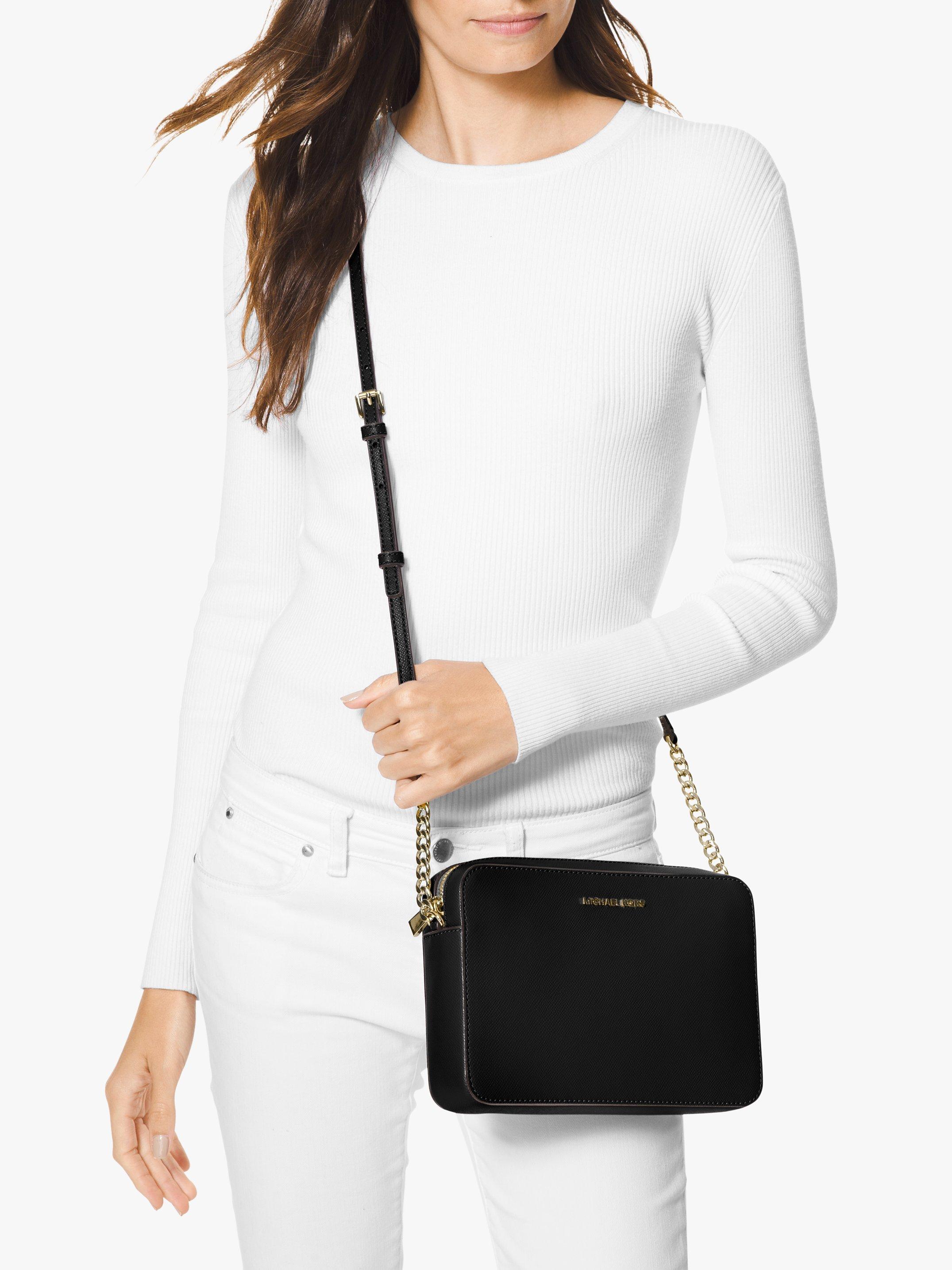 Michael kors black and gold crossbody purse hotsell