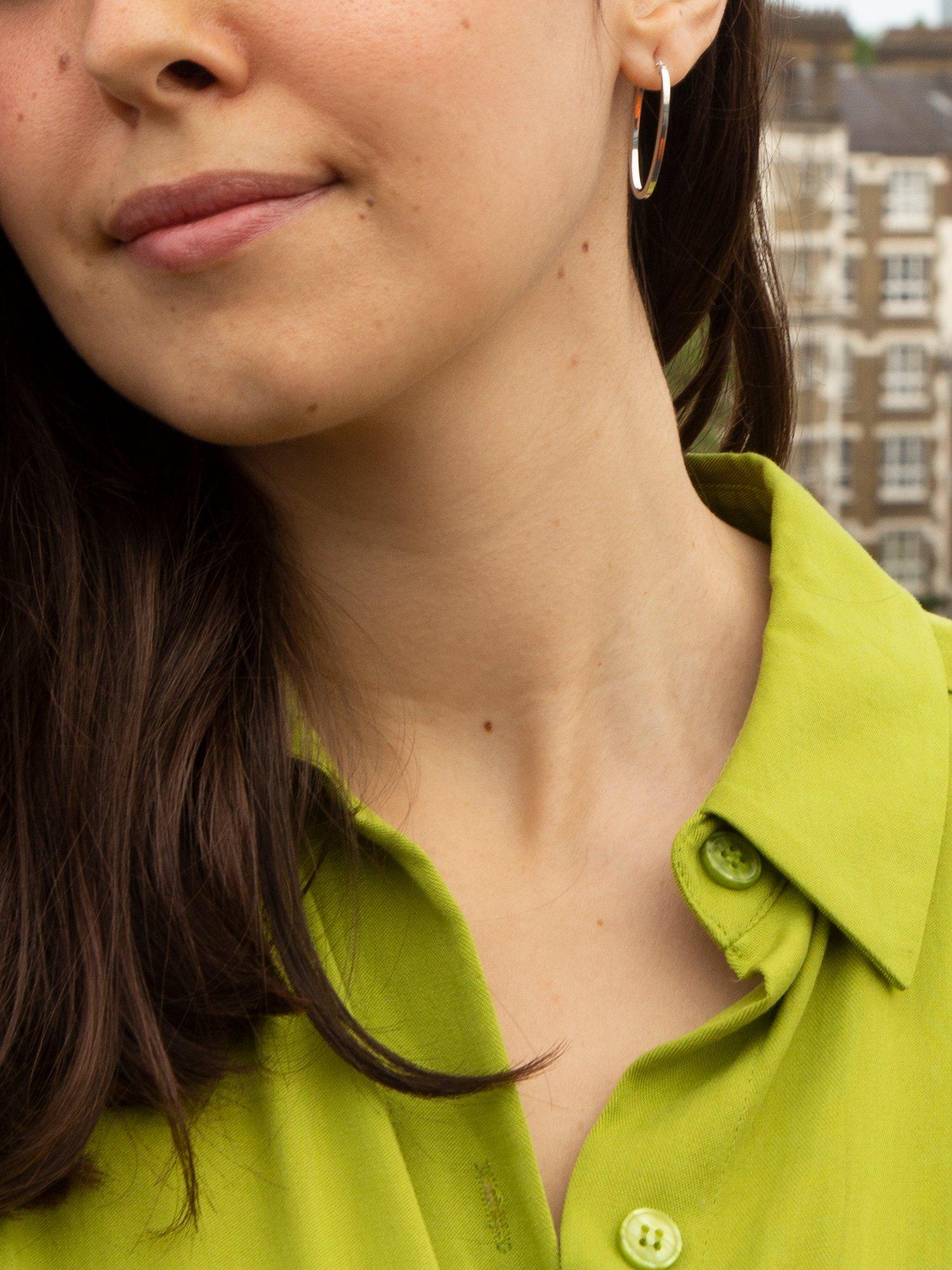 Product image 4 of 4, which shows IBB 9ct White Gold Oval Creole Earrings, White Gold