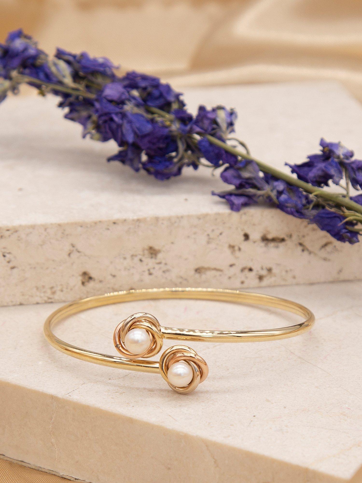 Product image 2 of 3, which shows IBB 9ct Three Colour Gold Double Knot and Pearl Flexible Torque Bangle, Multi