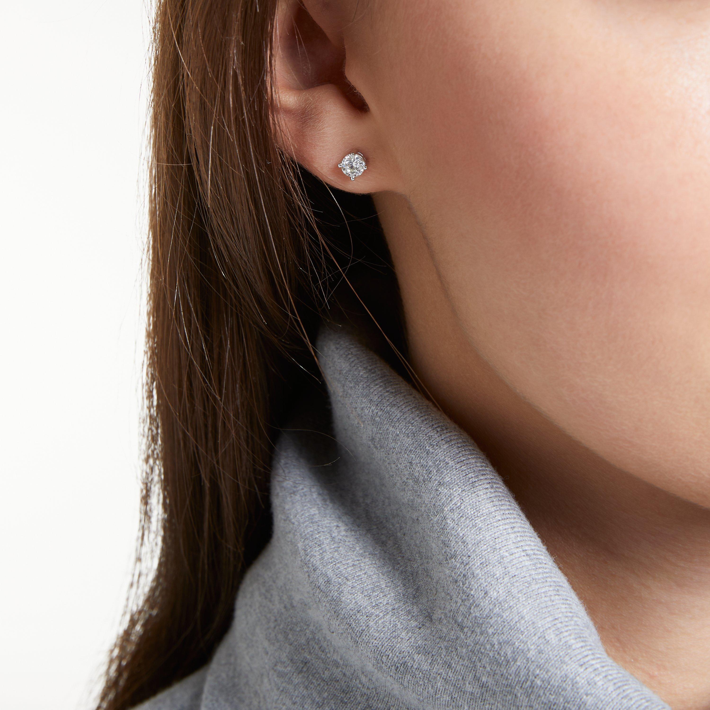Product image 2 of 7, which shows Mogul 18ct White Gold Round Brilliant Solitaire Diamond Stud Earrings, 0.75ct