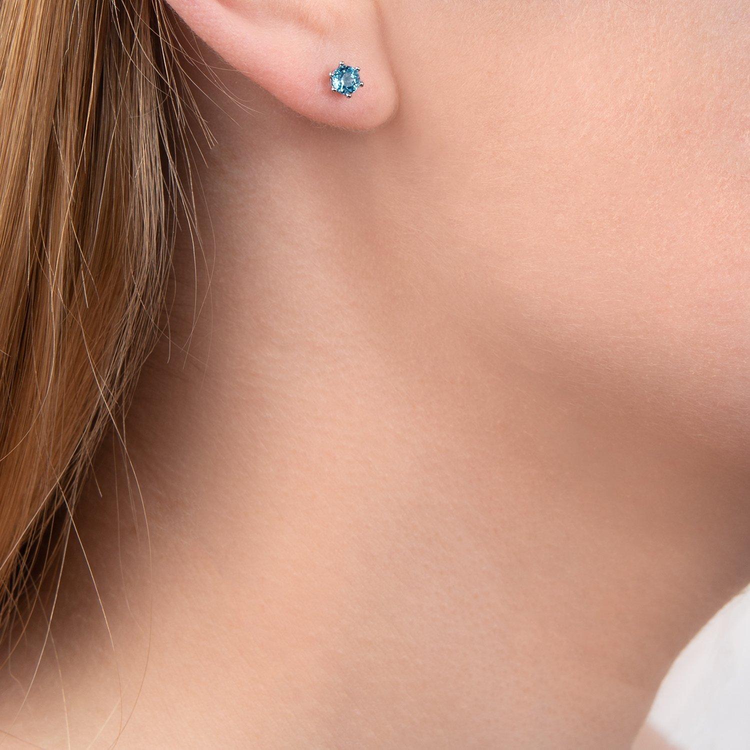 Product image 2 of 3, which shows E.W Adams 9ct White Gold Small Round Stud Earrings, Blue Topaz