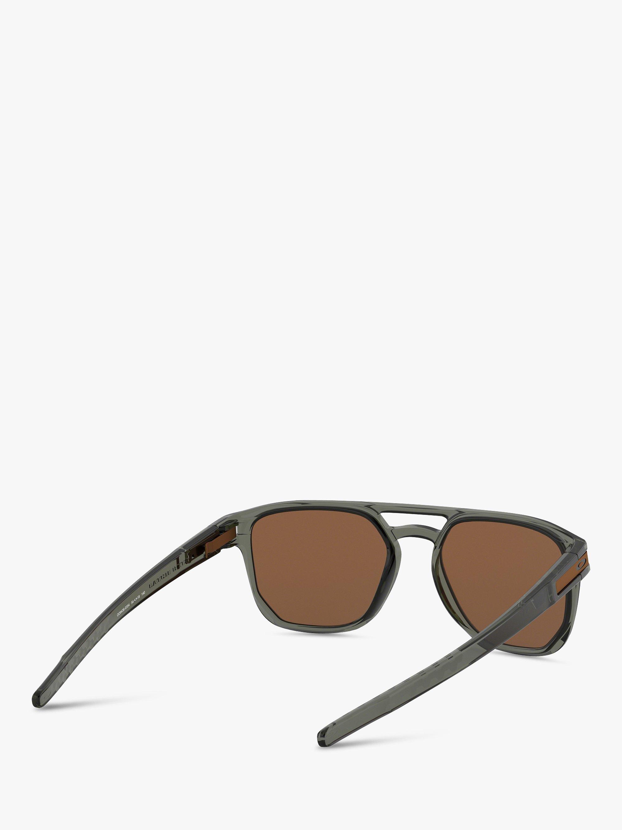 Product image 8 of 11, which shows Oakley OO9436 Men's Latch Beta Prizm Oval Sunglasses, Black/Mirror Brown