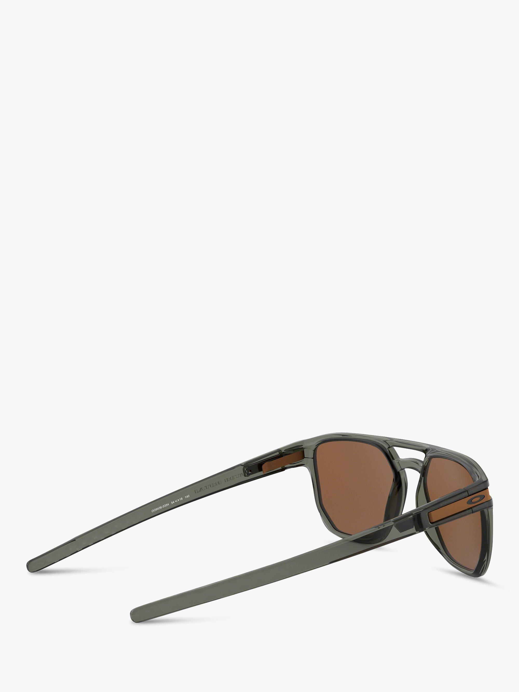 Product image 9 of 11, which shows Oakley OO9436 Men's Latch Beta Prizm Oval Sunglasses, Black/Mirror Brown