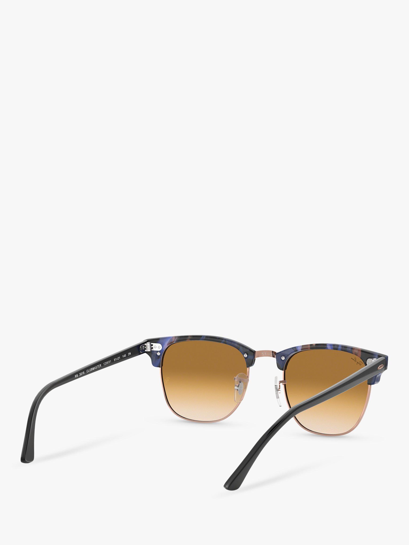 Product image 8 of 11, which shows Ray-Ban RB3016 Men's Classic Clubmaster Sunglasses, Spotted Blue/Brown Gradient
