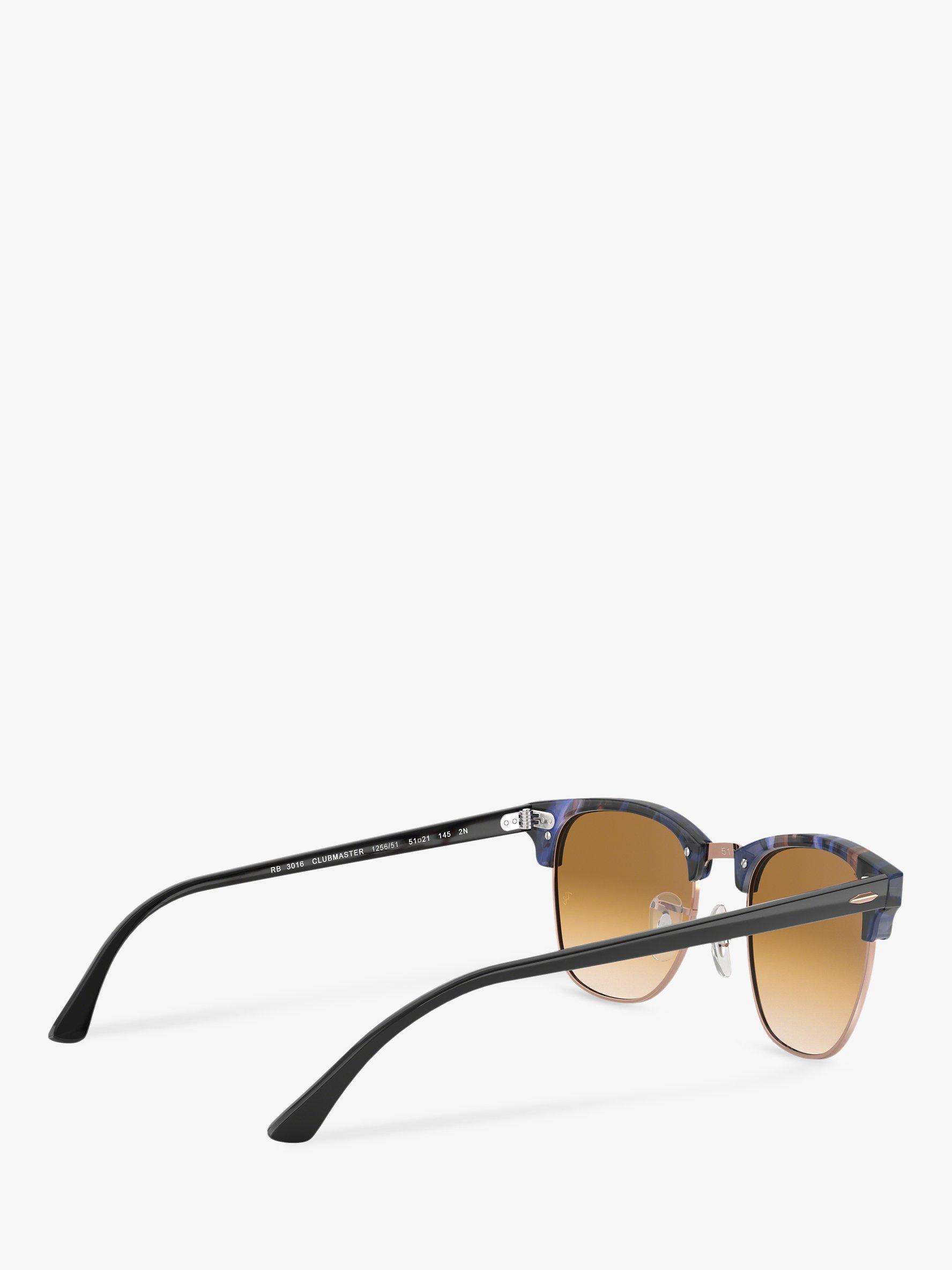 Product image 9 of 11, which shows Ray-Ban RB3016 Men's Classic Clubmaster Sunglasses, Spotted Blue/Brown Gradient