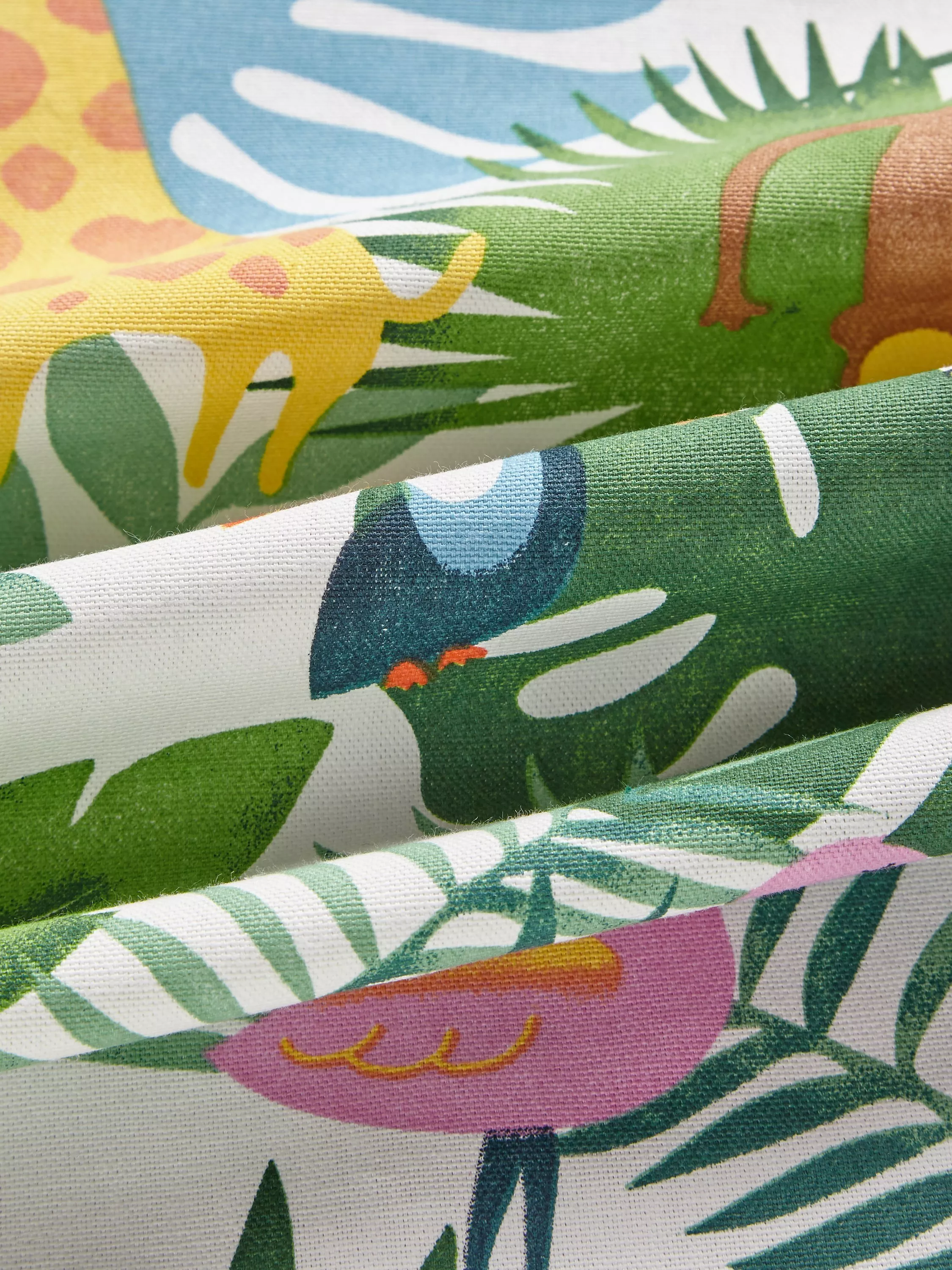 Fabric with colourful jungle illustration
