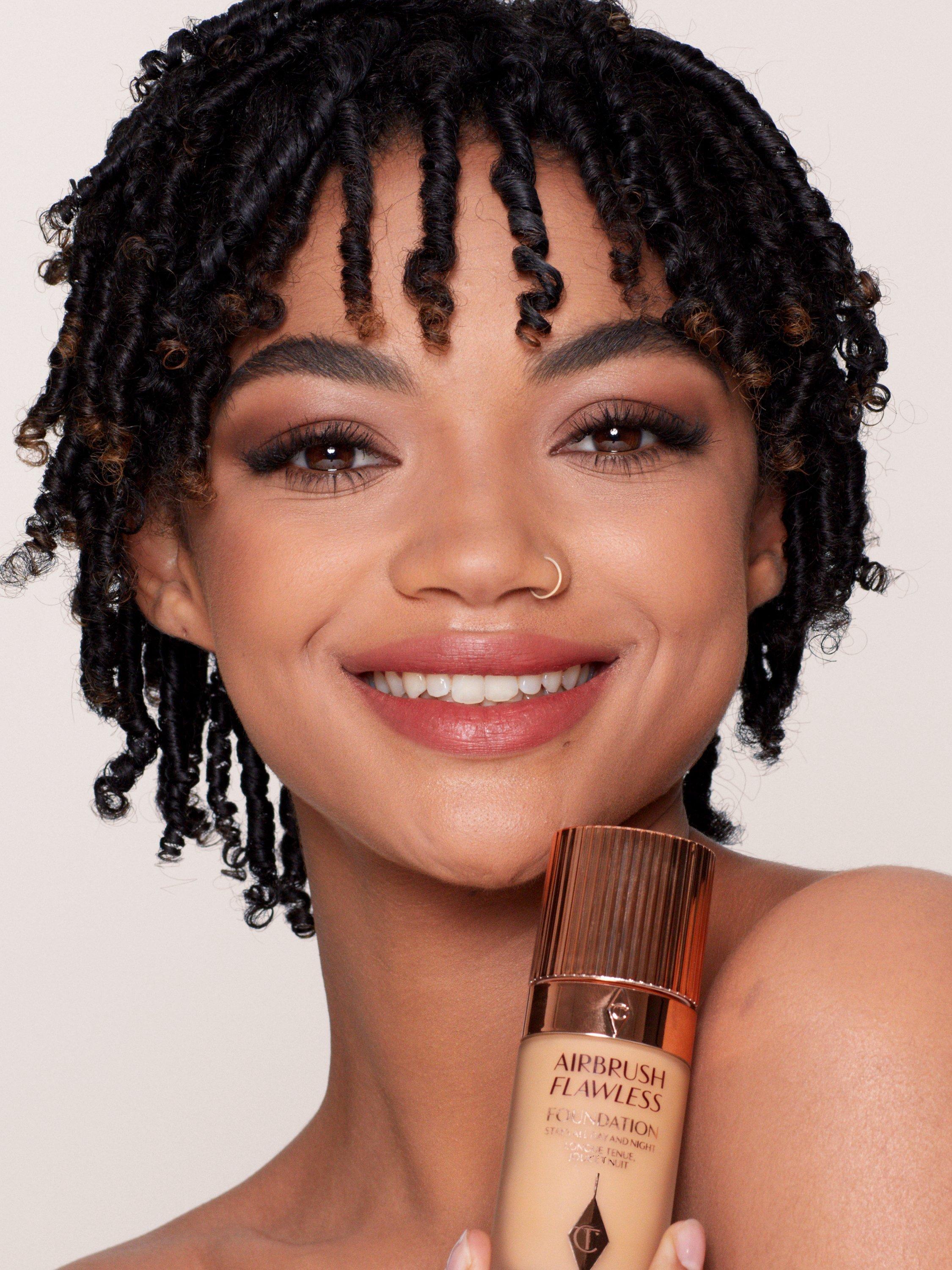 Product image 5 of 5, which shows Charlotte Tilbury Airbrush Flawless Foundation. 9 Warm