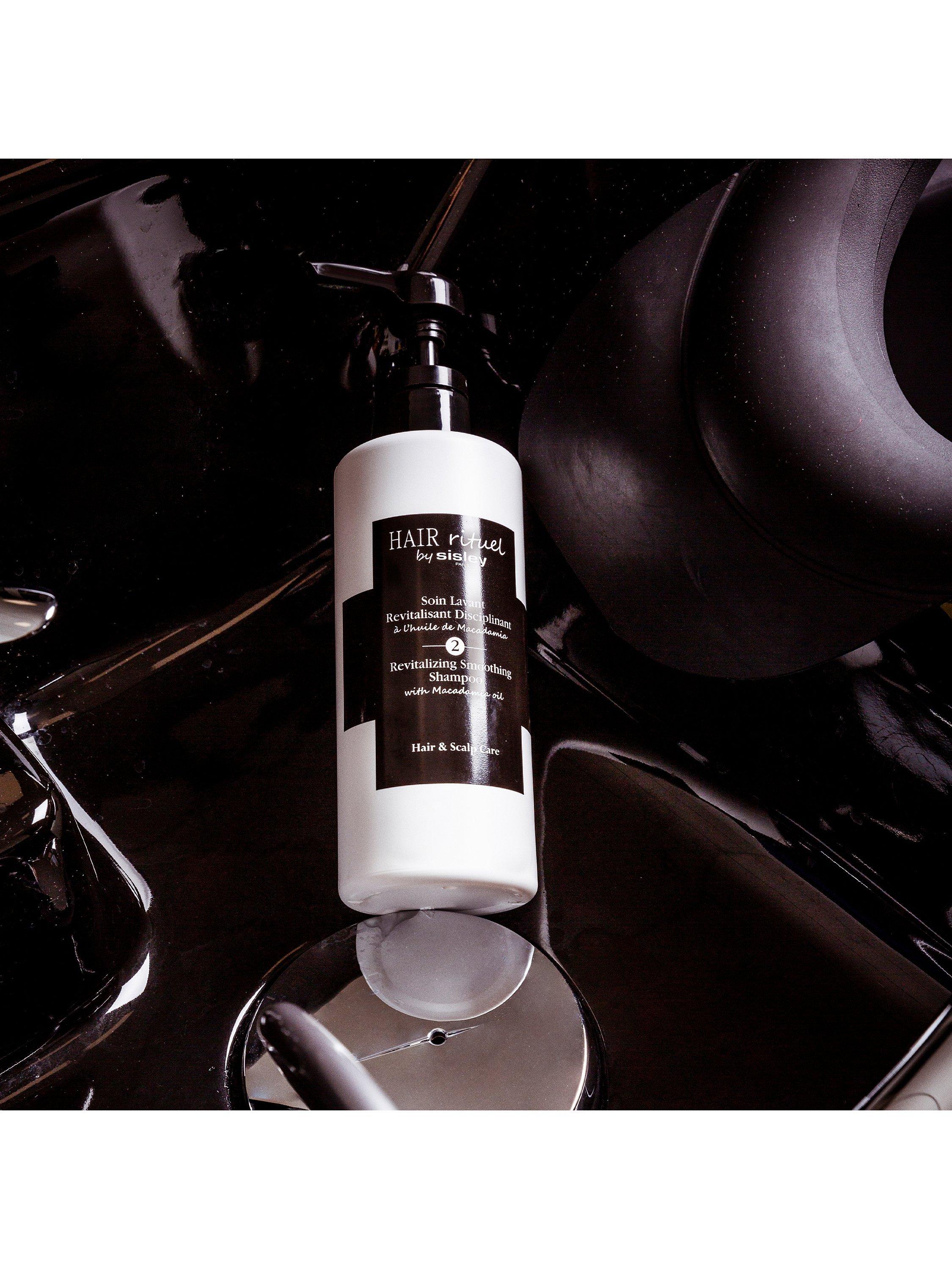 Product image 2 of 3, which shows Sisley-Paris Revitalising Volumising Shampoo with Camellia Oil, 500ml