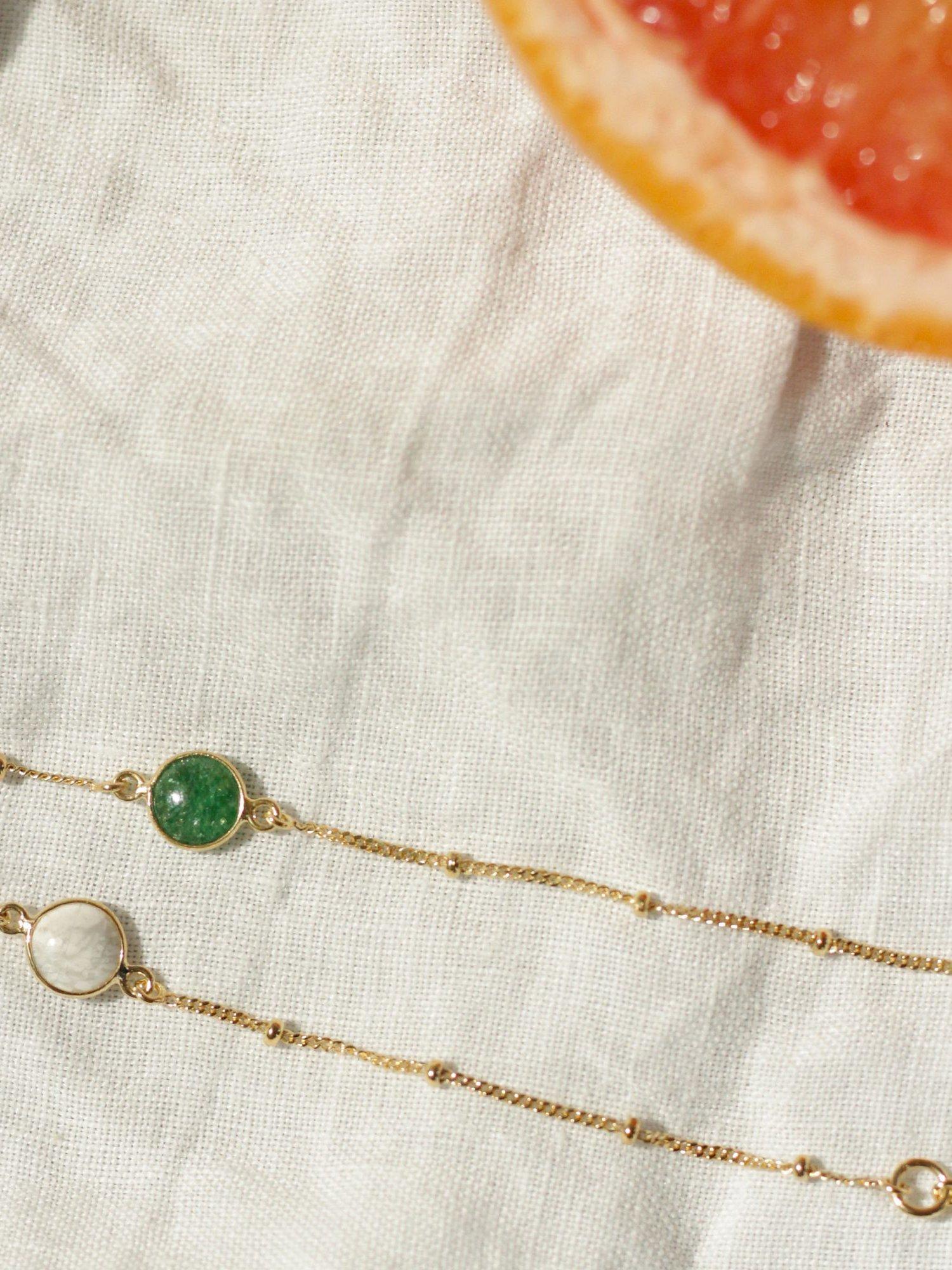 Product image 2 of 4, which shows Daisy London Healing Charm Chain Bracelet, Gold/Green
