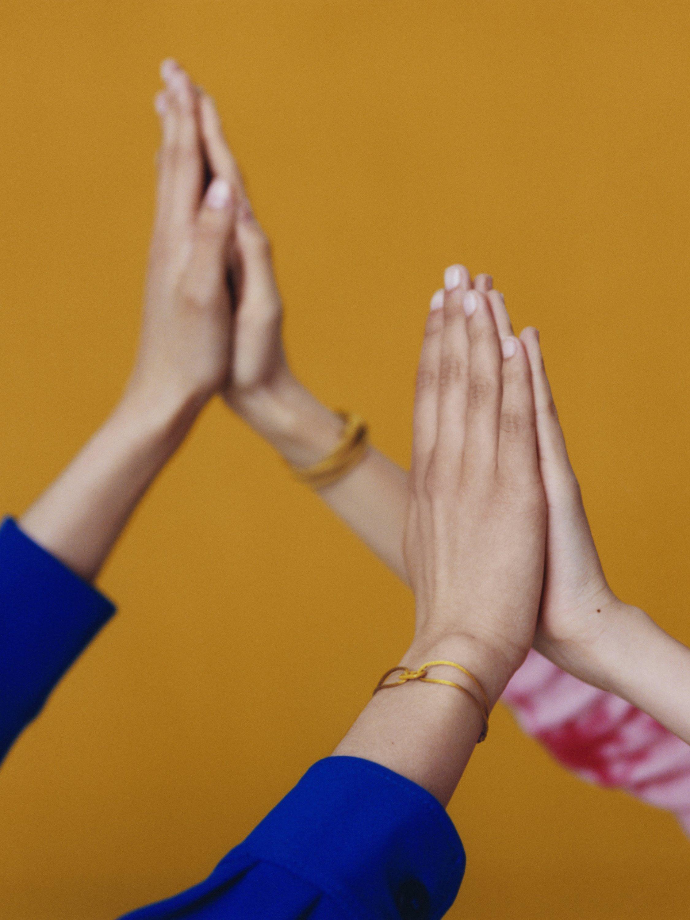 Product image 6 of 6, which shows #TOGETHERBAND UN Goal 12 - Responsible Consumption and Production Recycled Plastic Classic Bracelet, Pack of 2, Dark Mustard