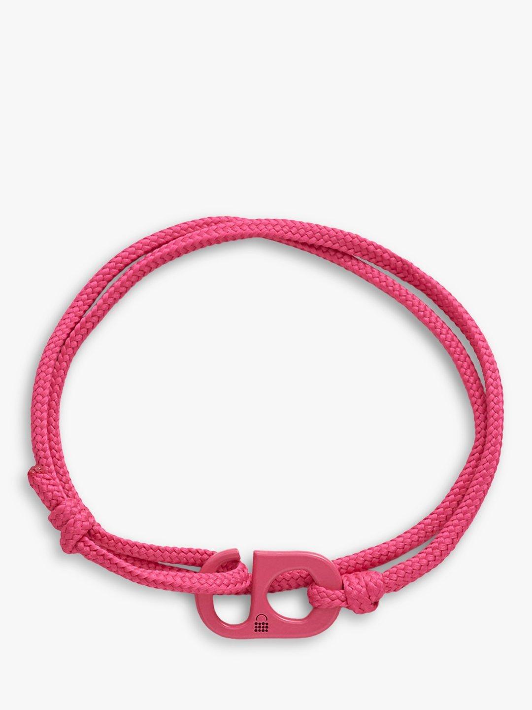 Product image 2 of 6, which shows #TOGETHERBAND UN Goal 10 - Reduced Inequalities Recycled Plastic Classic Bracelet, Pack of 2, Magenta