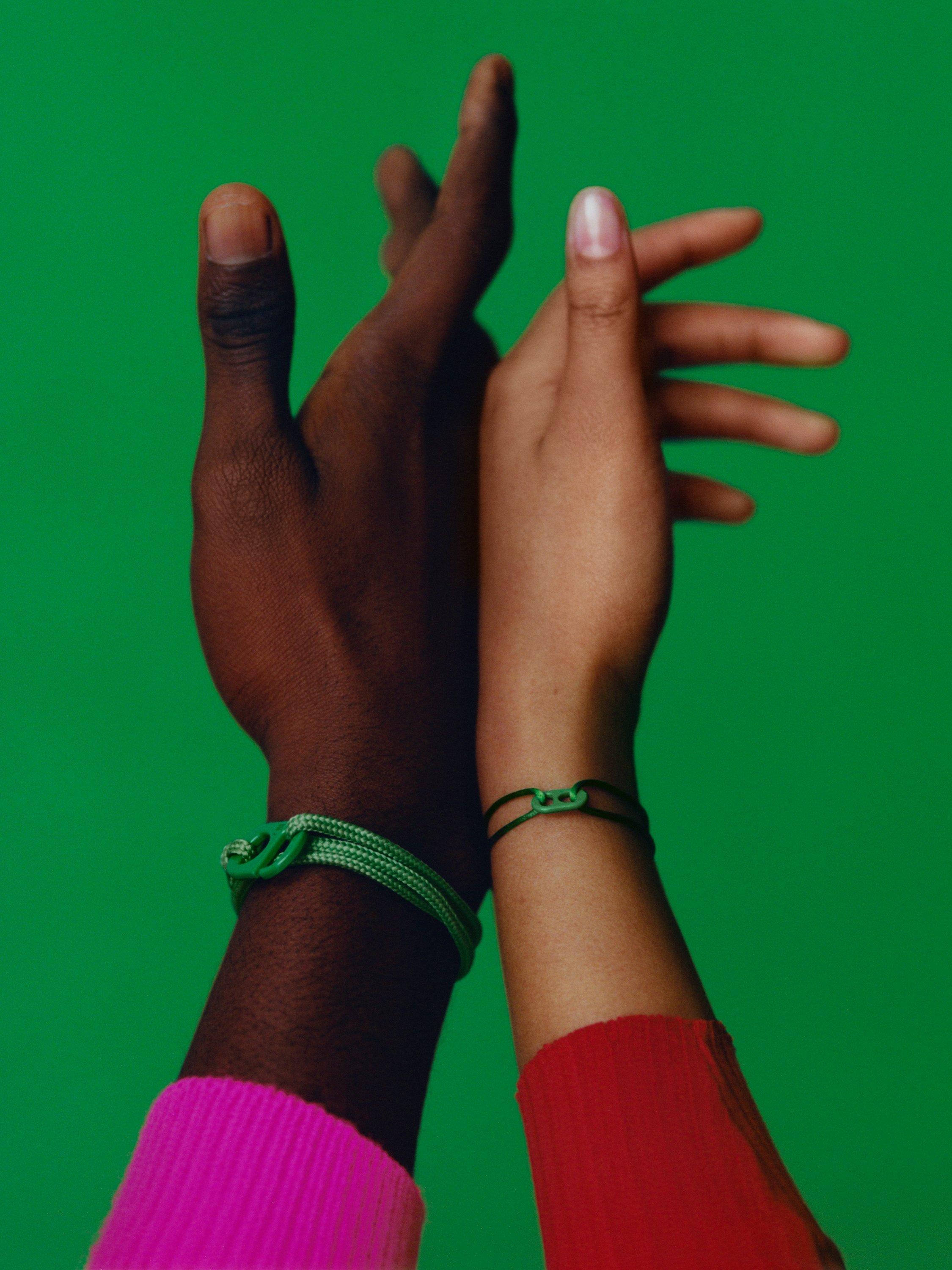 Product image 5 of 5, which shows #TOGETHERBAND UN Goal 3 - Good Health and Well-Being Recycled Plastic Classic Bracelet, Pack of 2, Green