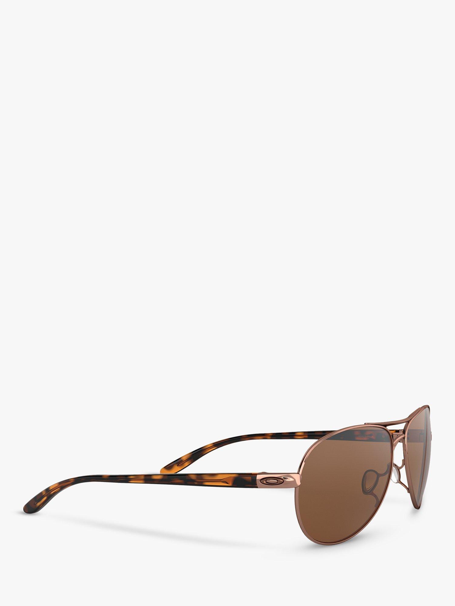 Product image 11 of 11, which shows Oakley OO4079 Women's Feedback Polarised Aviator Sunglasses, Rose Gold/Brown