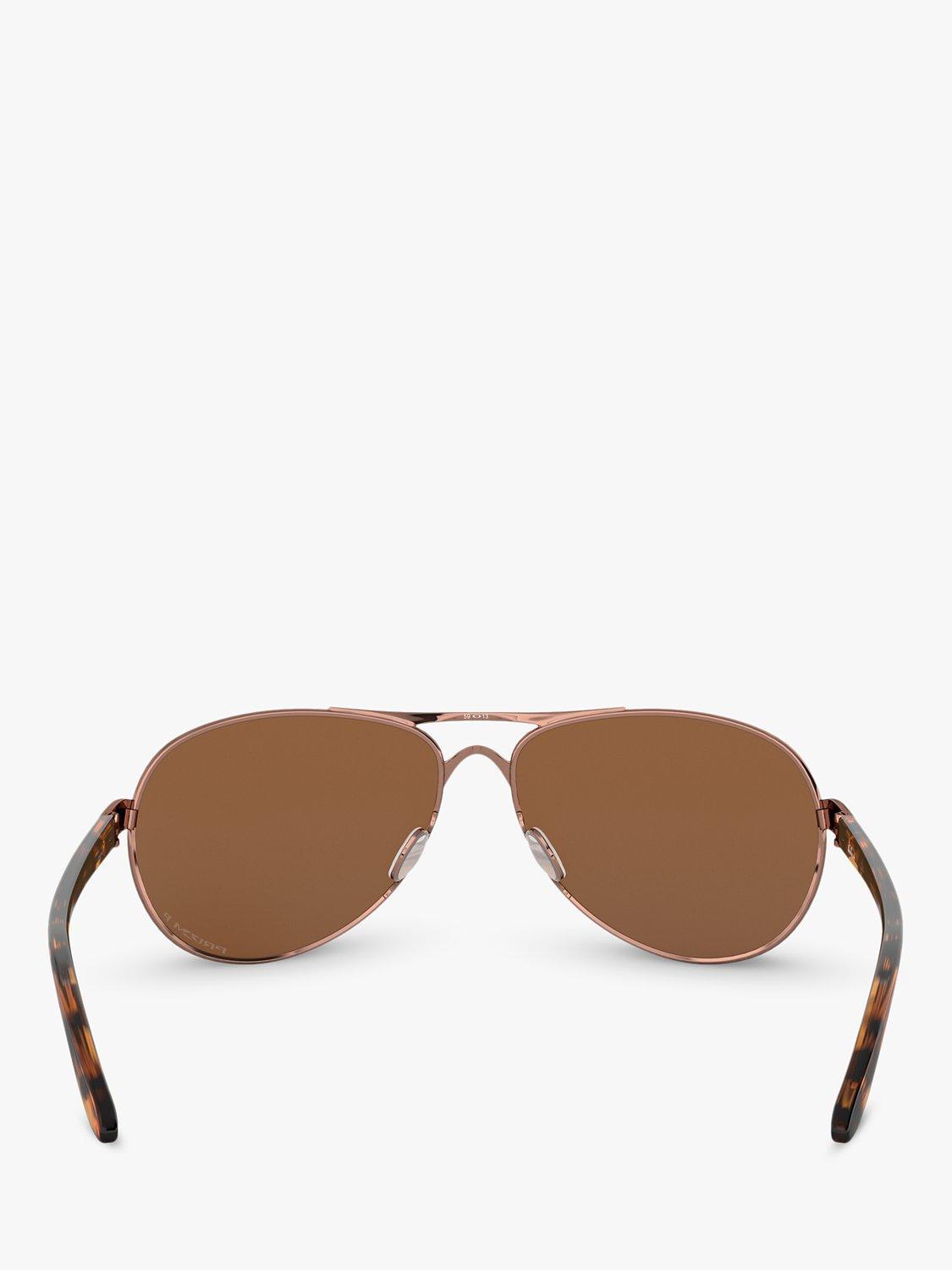 Product image 7 of 11, which shows Oakley OO4079 Women's Feedback Polarised Aviator Sunglasses, Rose Gold/Brown