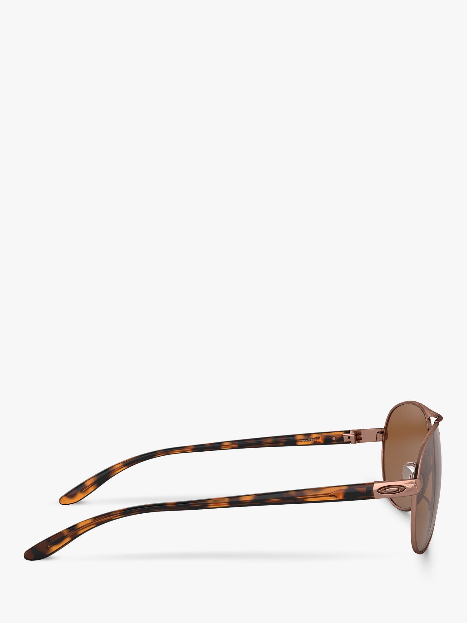 Product image 10 of 11, which shows Oakley OO4079 Women's Feedback Polarised Aviator Sunglasses, Rose Gold/Brown