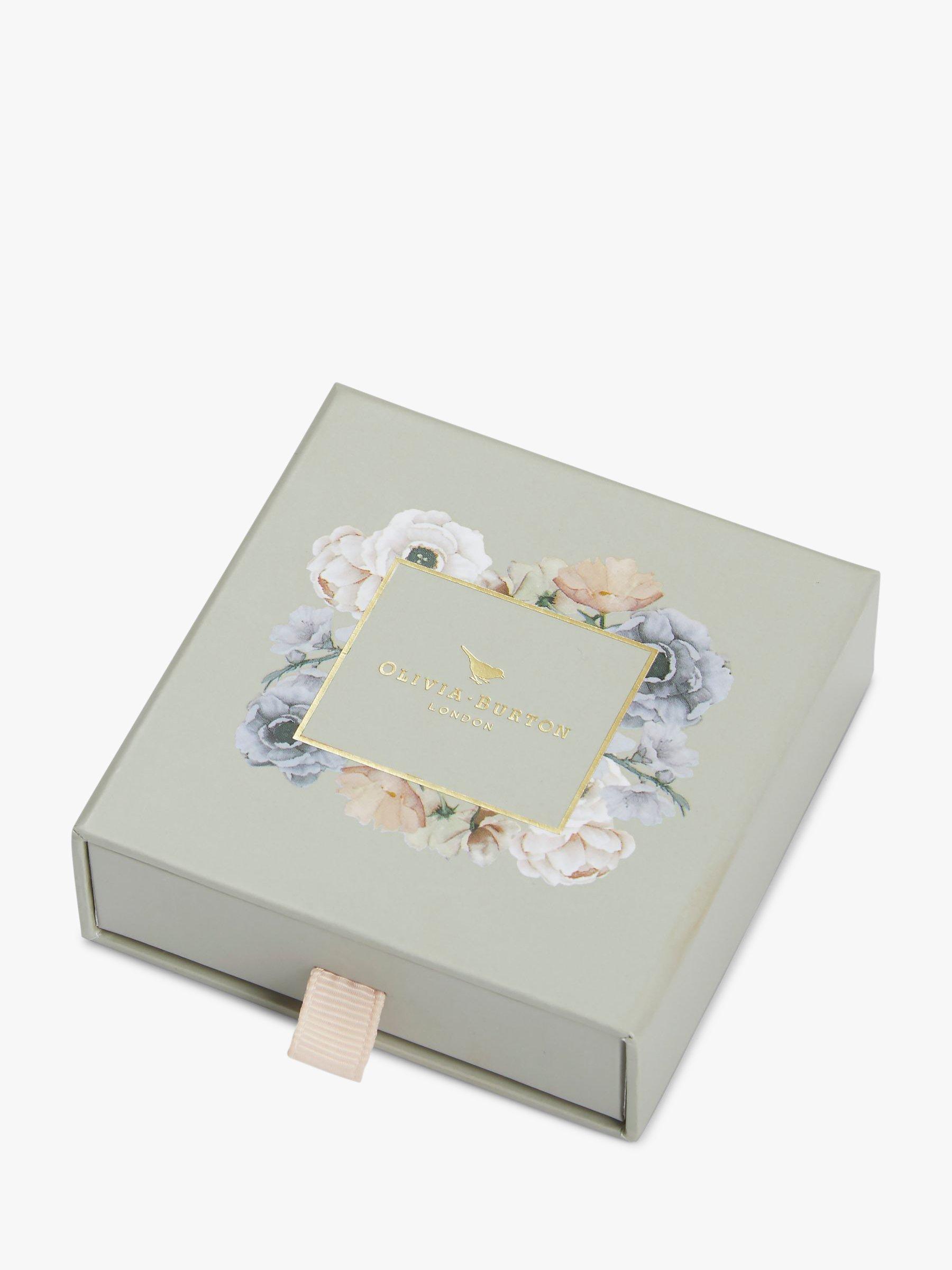 Product image 4 of 4, which shows Olivia Burton Celestial Crystal Moon and North Star Huggie Hoop Earrings, Gold OBJCLE39