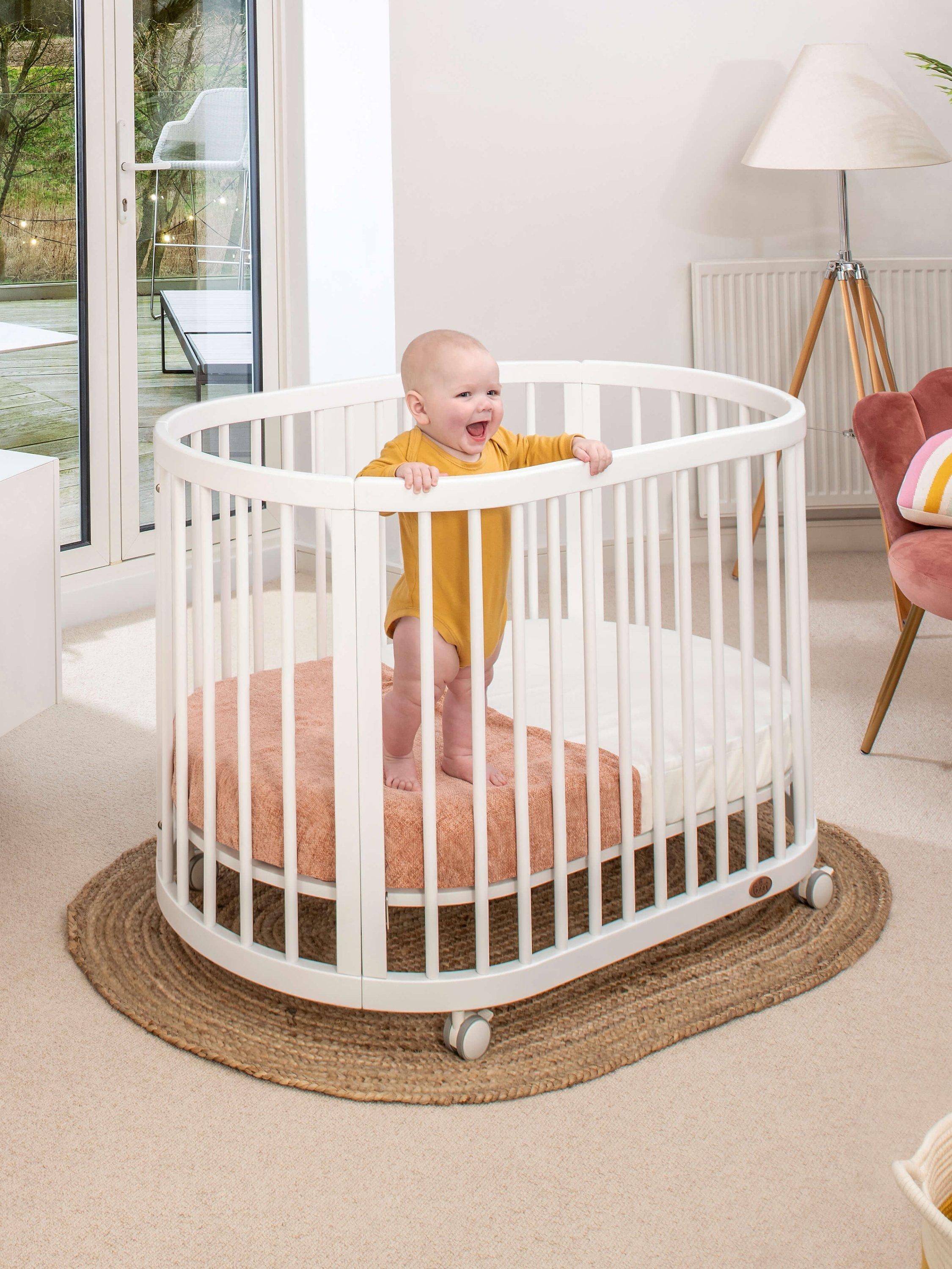 Oval cot bed on sale