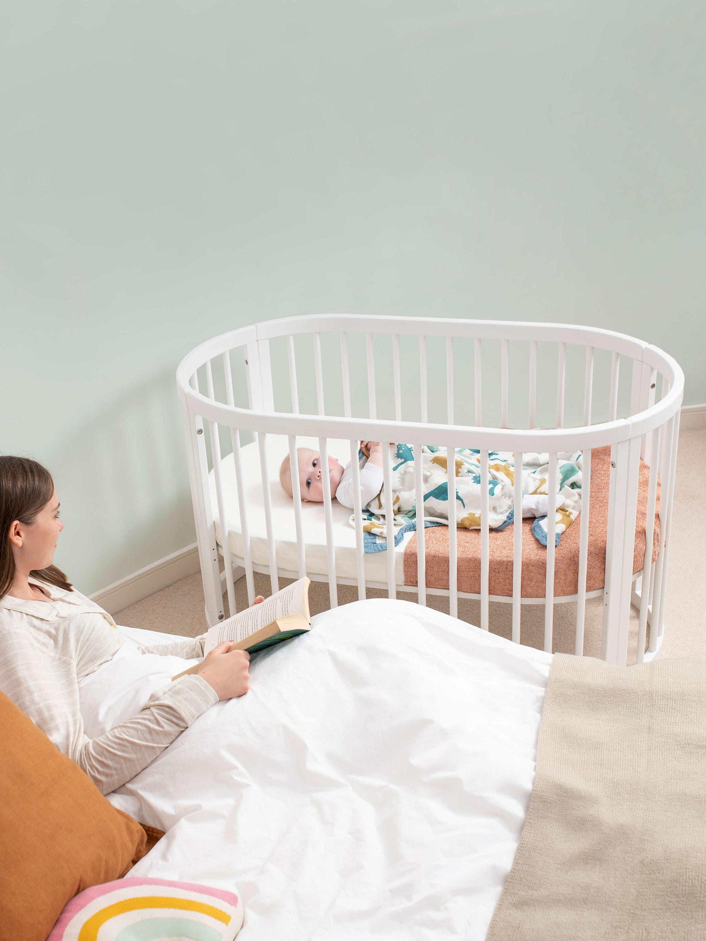 Oval baby bed on sale