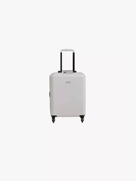 White hard shell suitcase with telescopic handle and four spinner wheels, minimalist travel luggage on white background