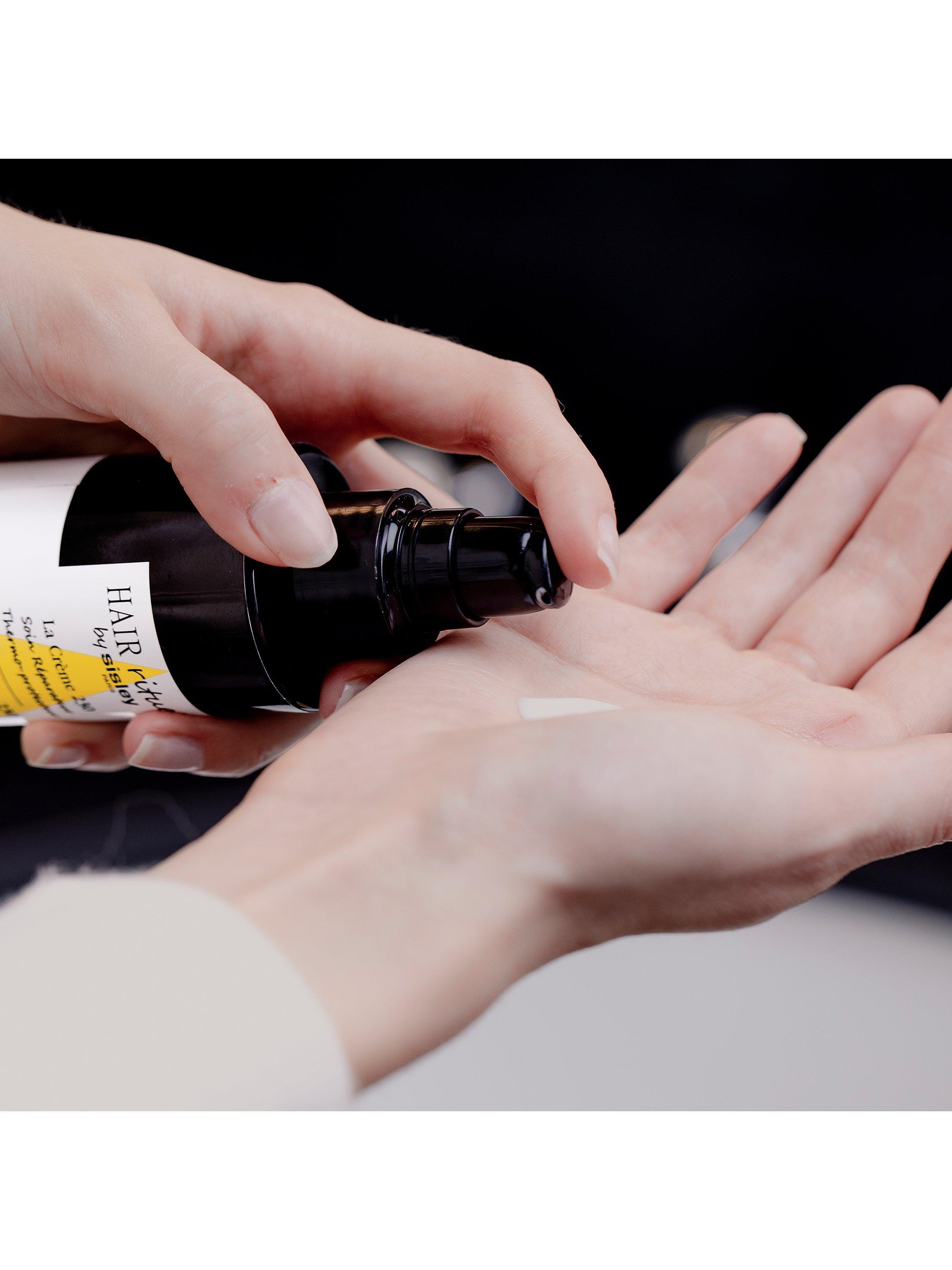 Product image 4 of 8, which shows Sisley-Paris Hair Rituel The Cream 230 Restorative & Thermo-Protective Action Hair & Scalp Care, 150ml